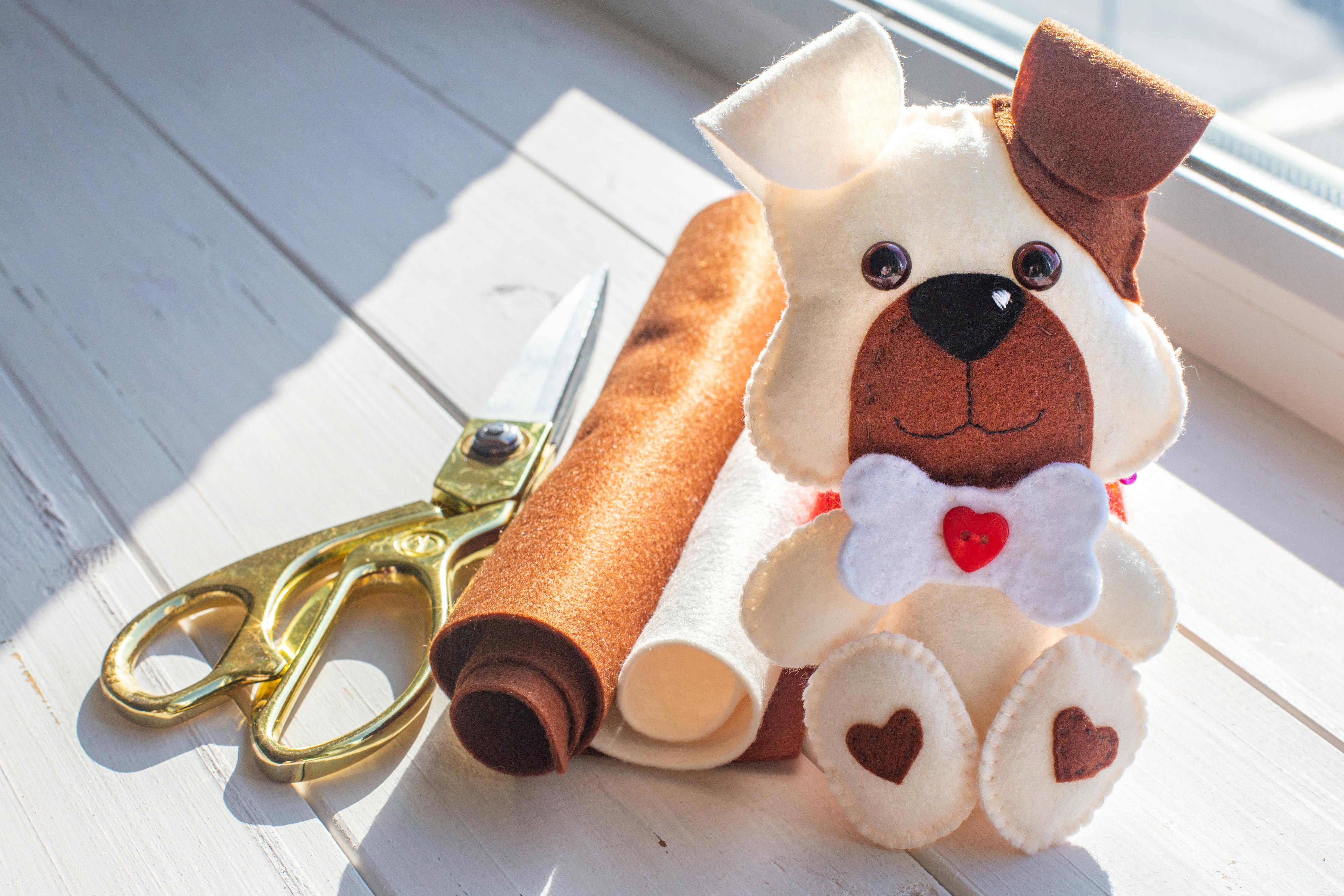  homemade felt dog soft toy with sewing supplies used