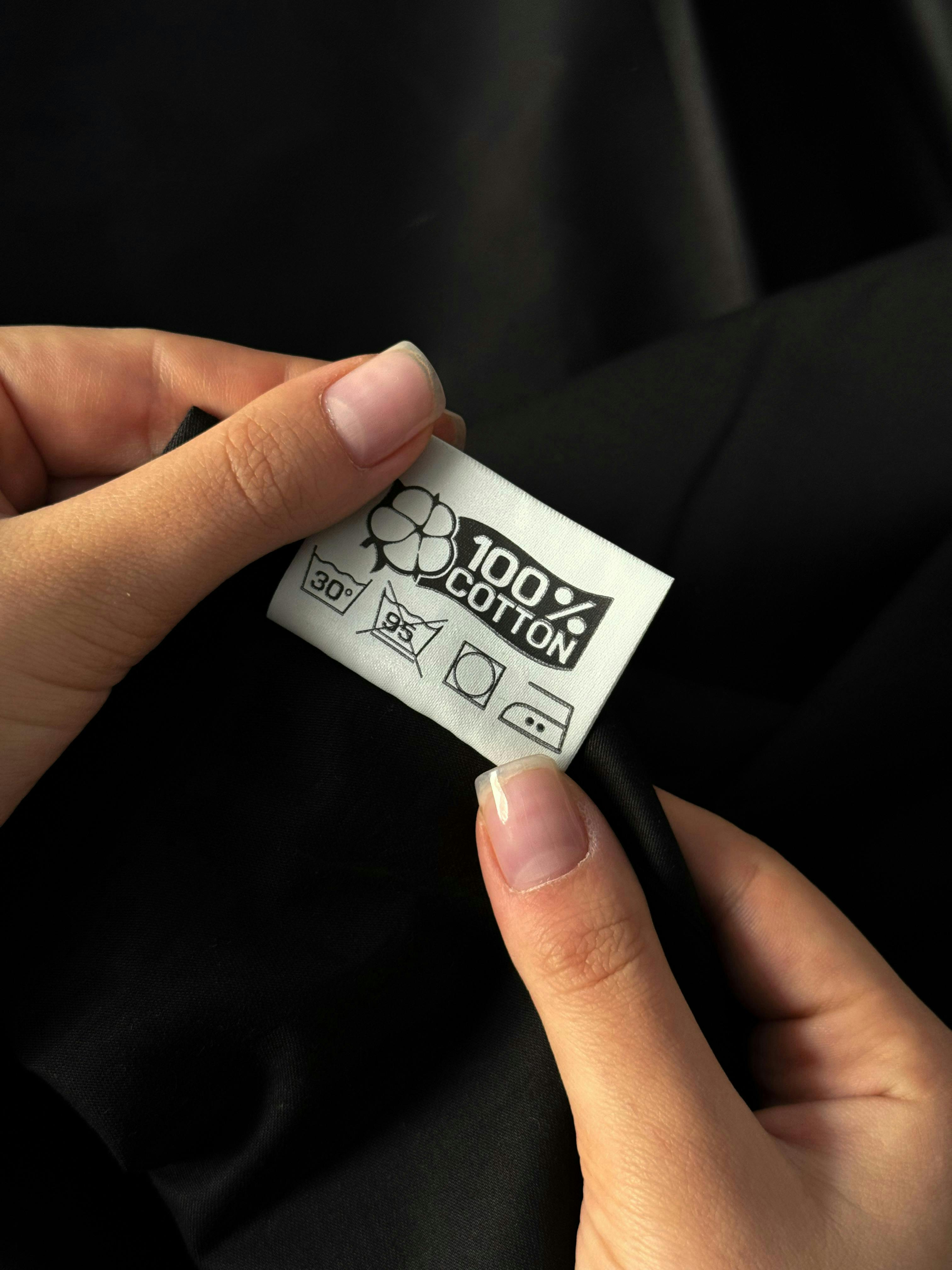  cotton label attached to a shirt 