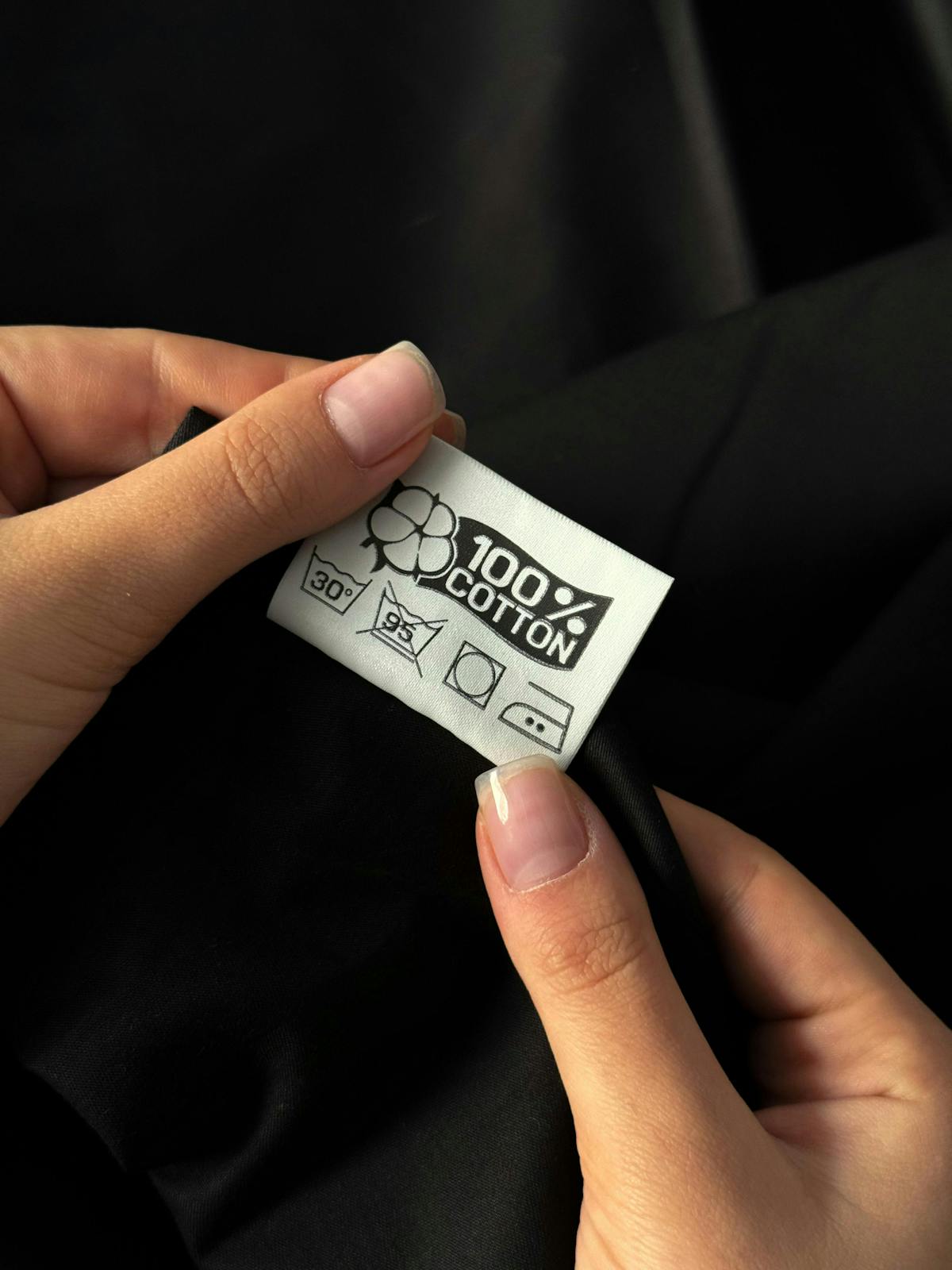 cotton label attached to a shirt 