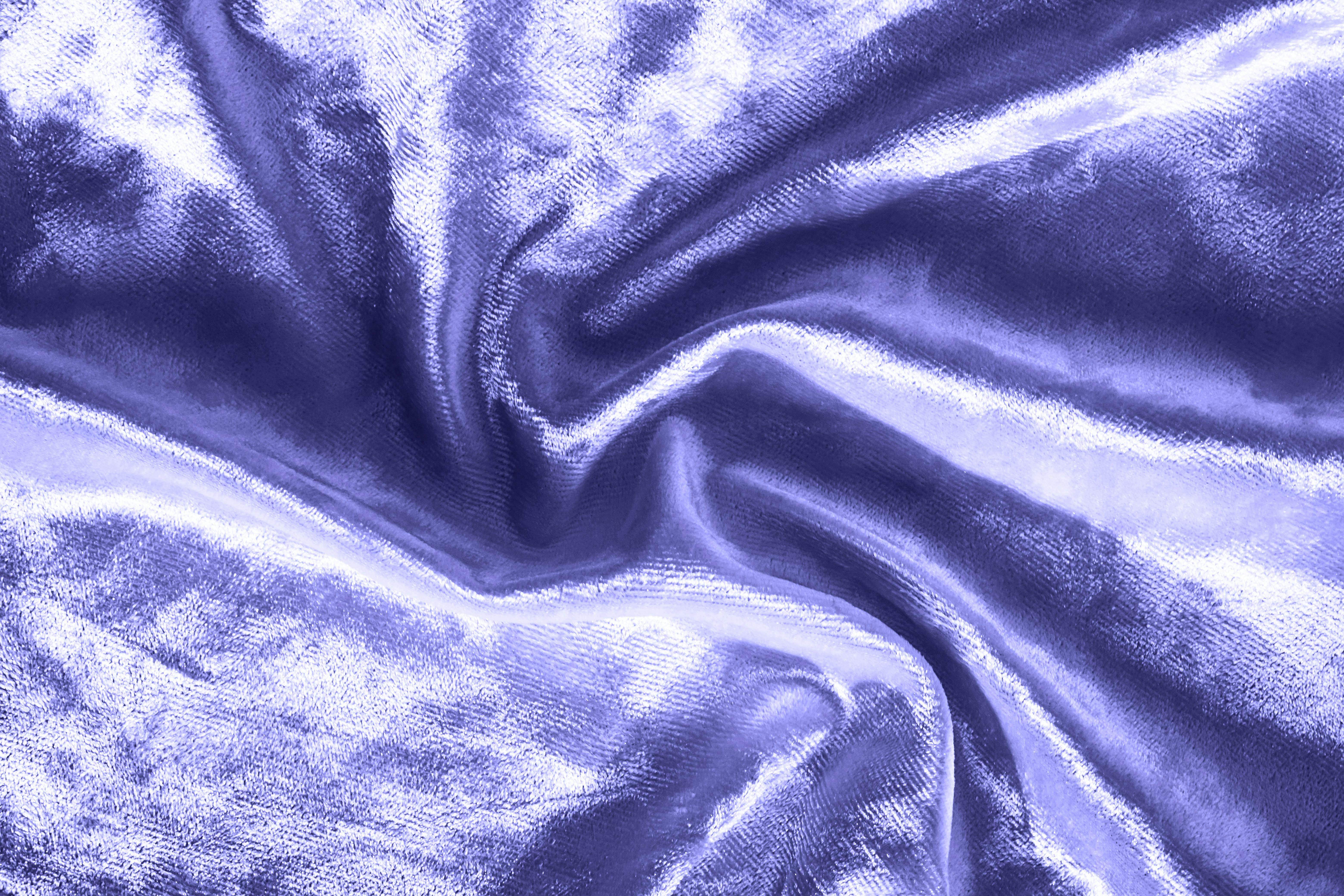 close up of purple velvet fabric swirled in a pattern
