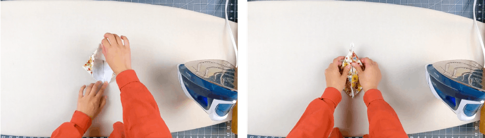  pushing layers up and inward on folded fabric