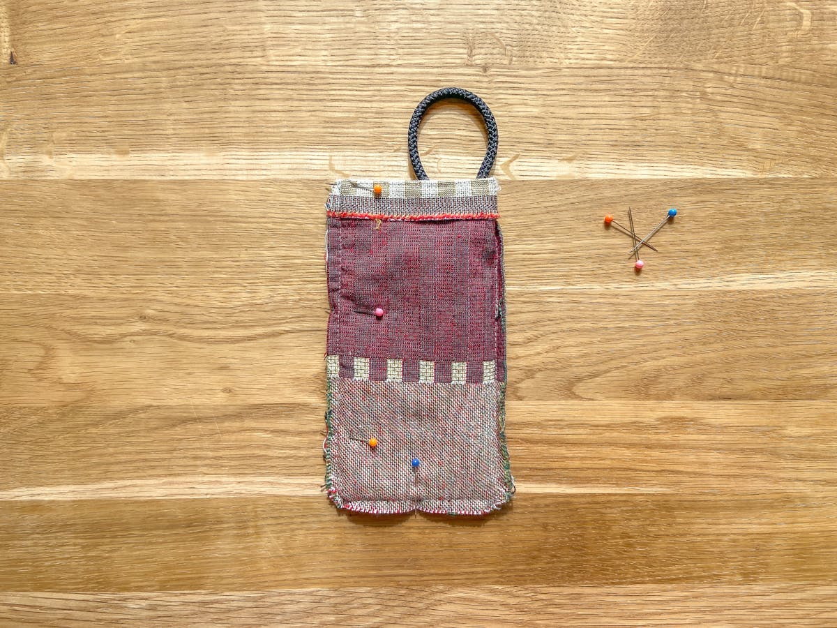  striped iphone sleeve inside out with pins