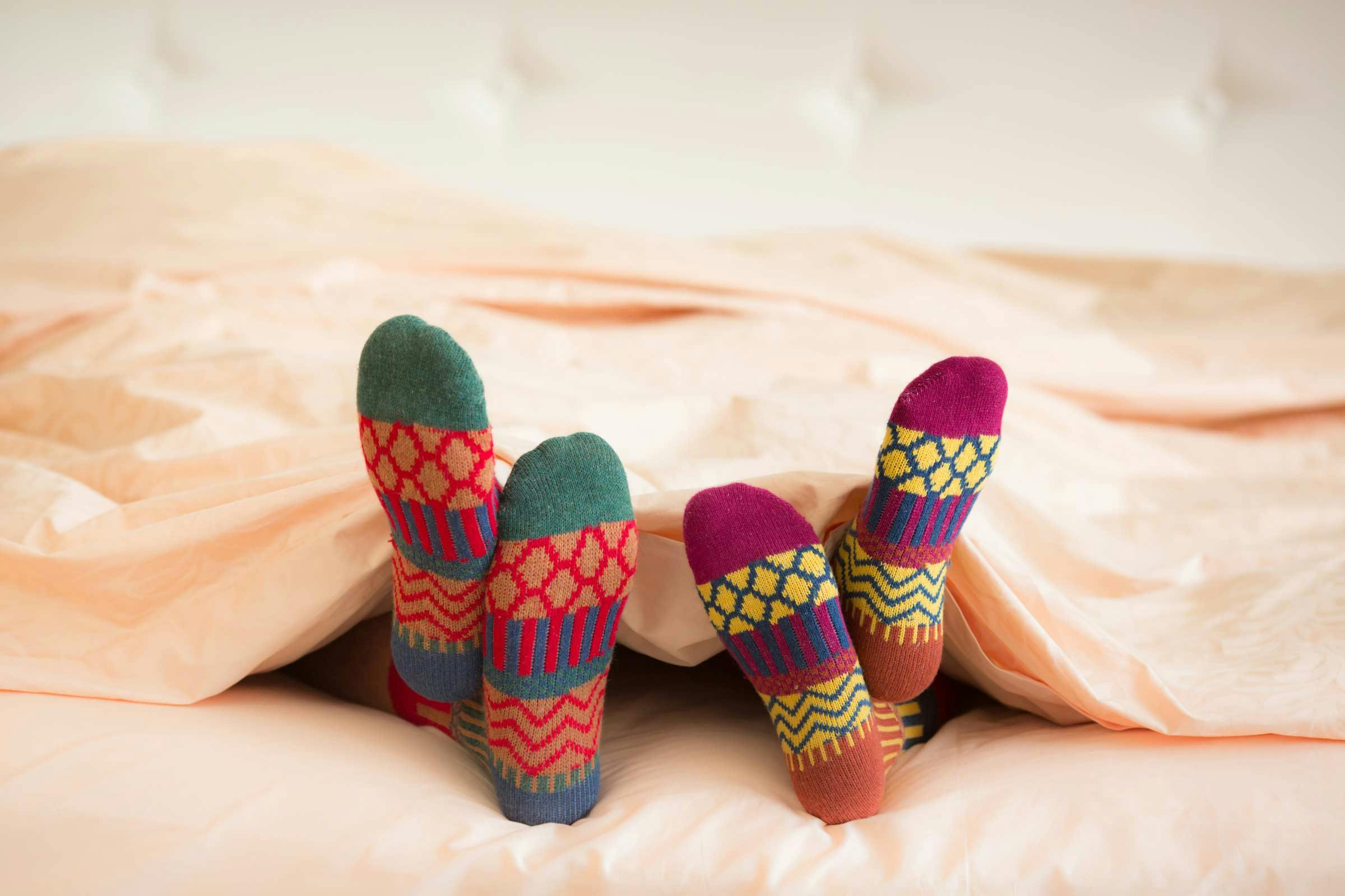 two pairs of colorful socks to celebrate national sock day