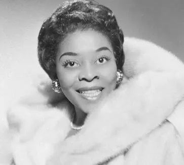 All dressed up for chilly December weather: Dinah Washington.