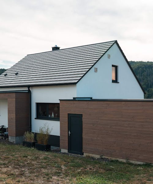 Neubau in Massivbauweise mit Carport