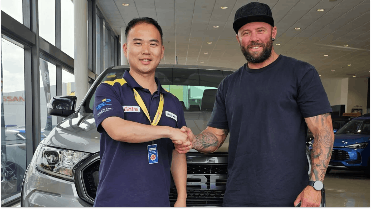 Happy easyauto123 customer, Russell Tarboton, with salepserson Jack at eayauto123 Manukau