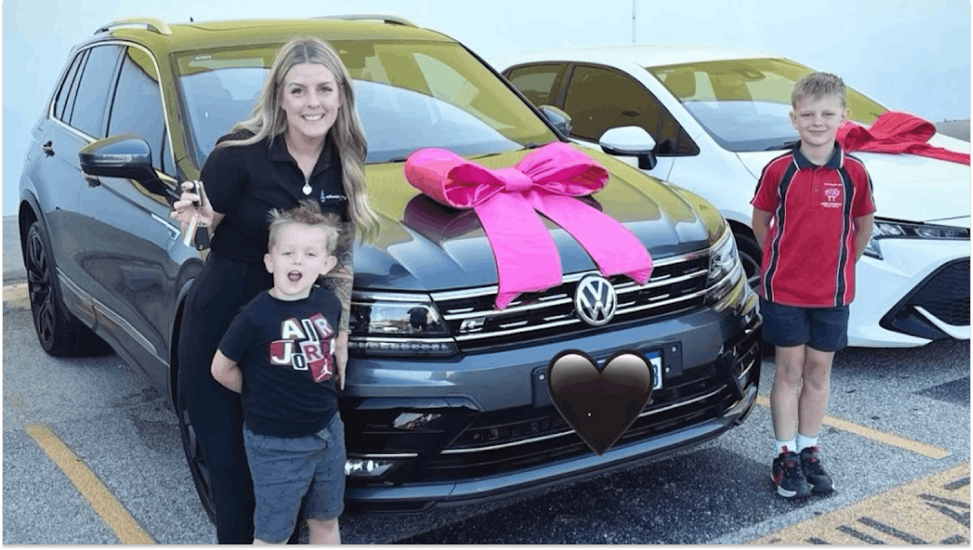 Mother and two children with their new Volkswagen bought from easyauto123 Mile End South