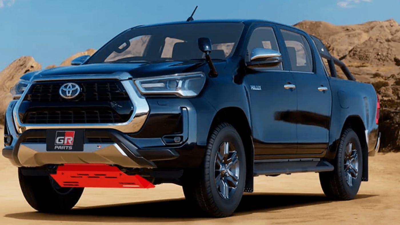 black modern toyota hilux on dirt
