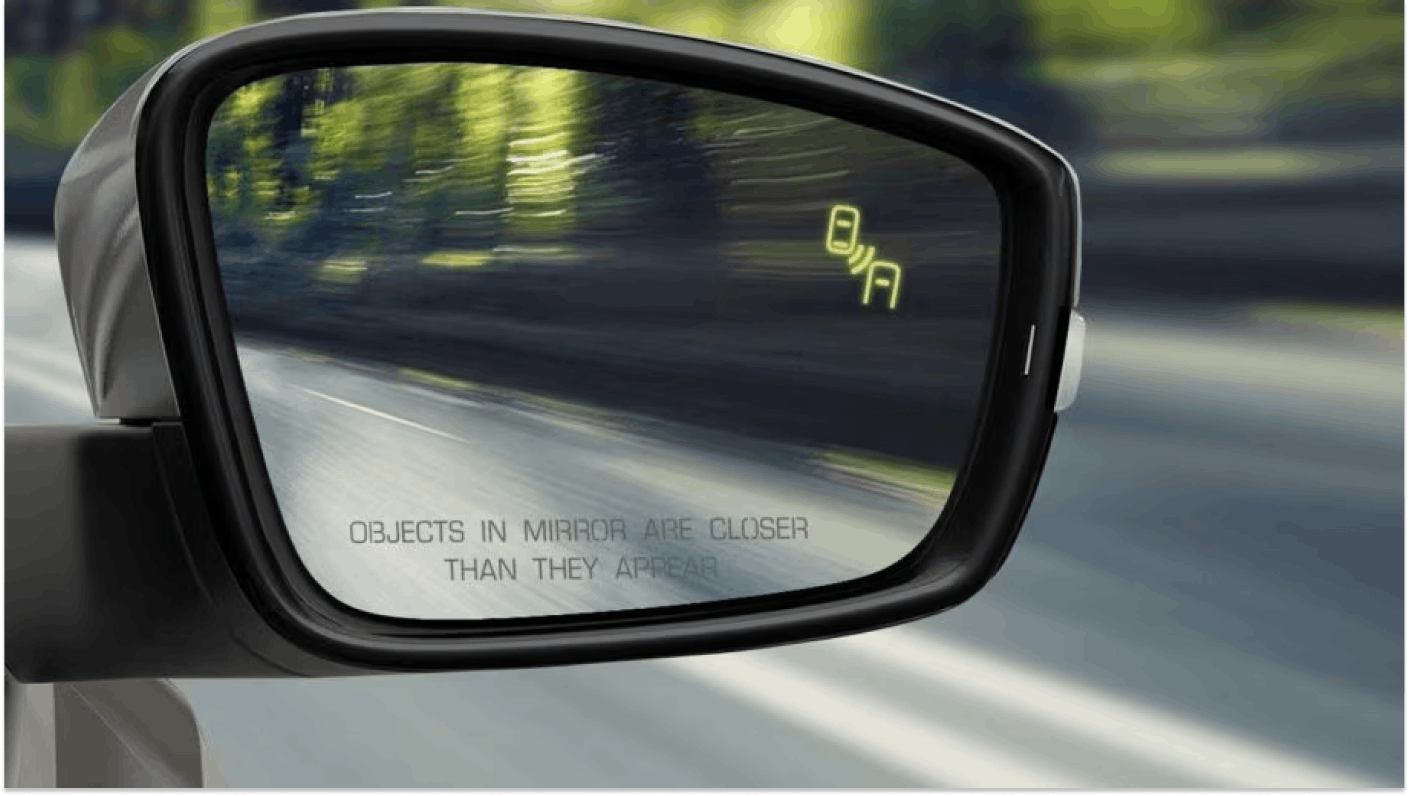 Image showing car wing mirror and blind-spot technology