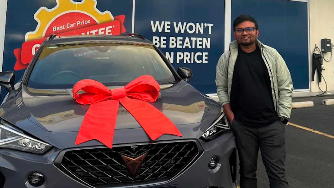 A young man and his electric used car at easyauto123 Hobart