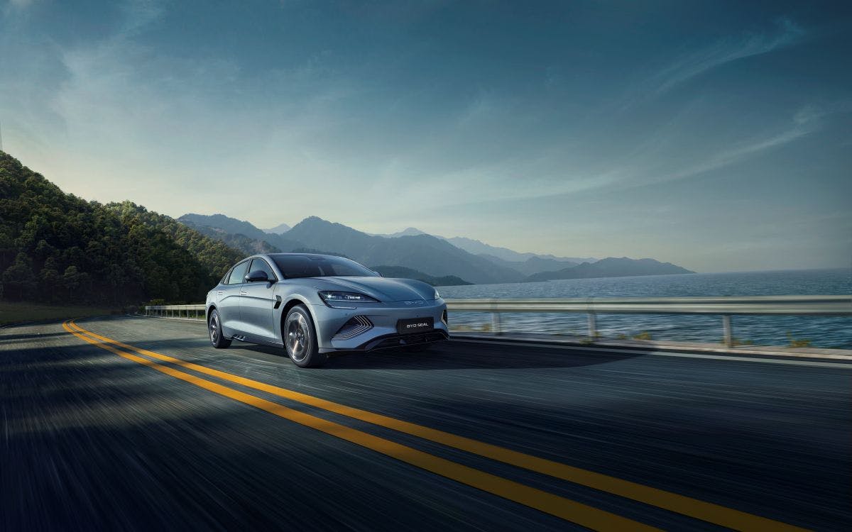 Electric vehicle driving over bridge