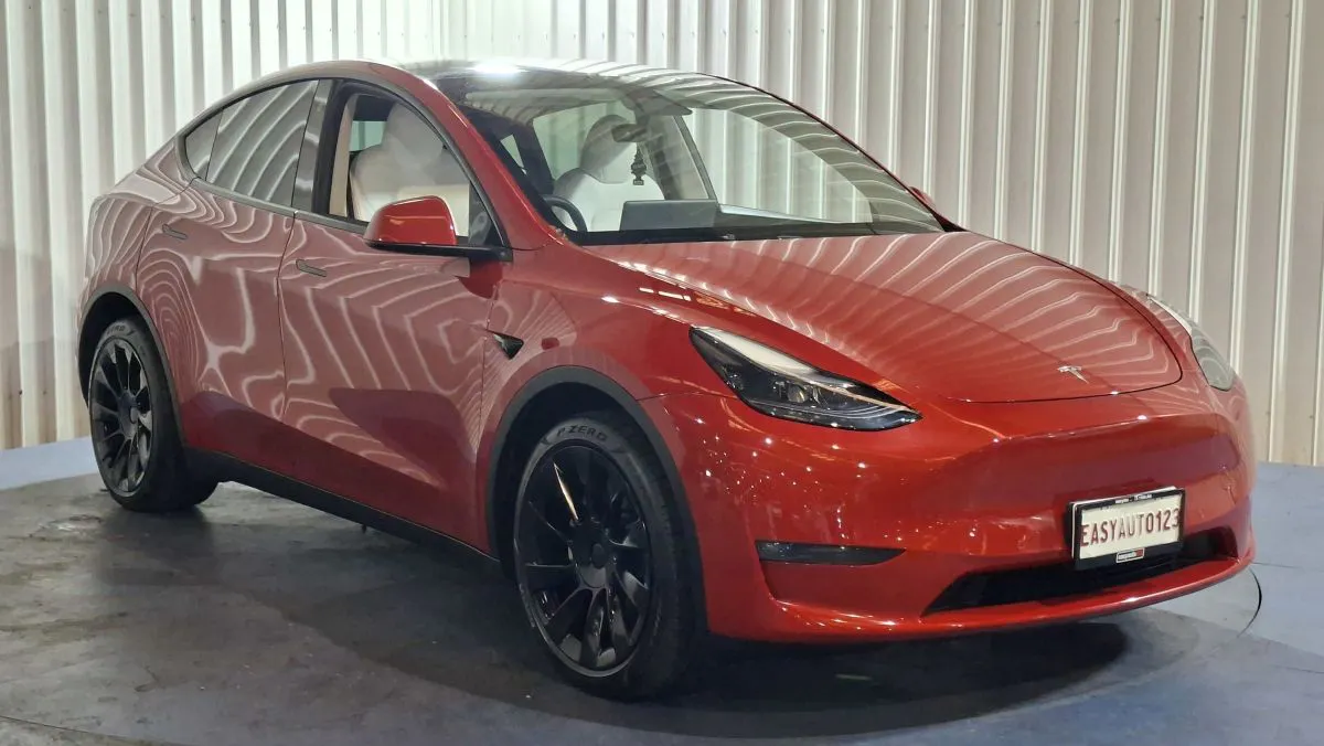 Red used Tesla electric vehicle