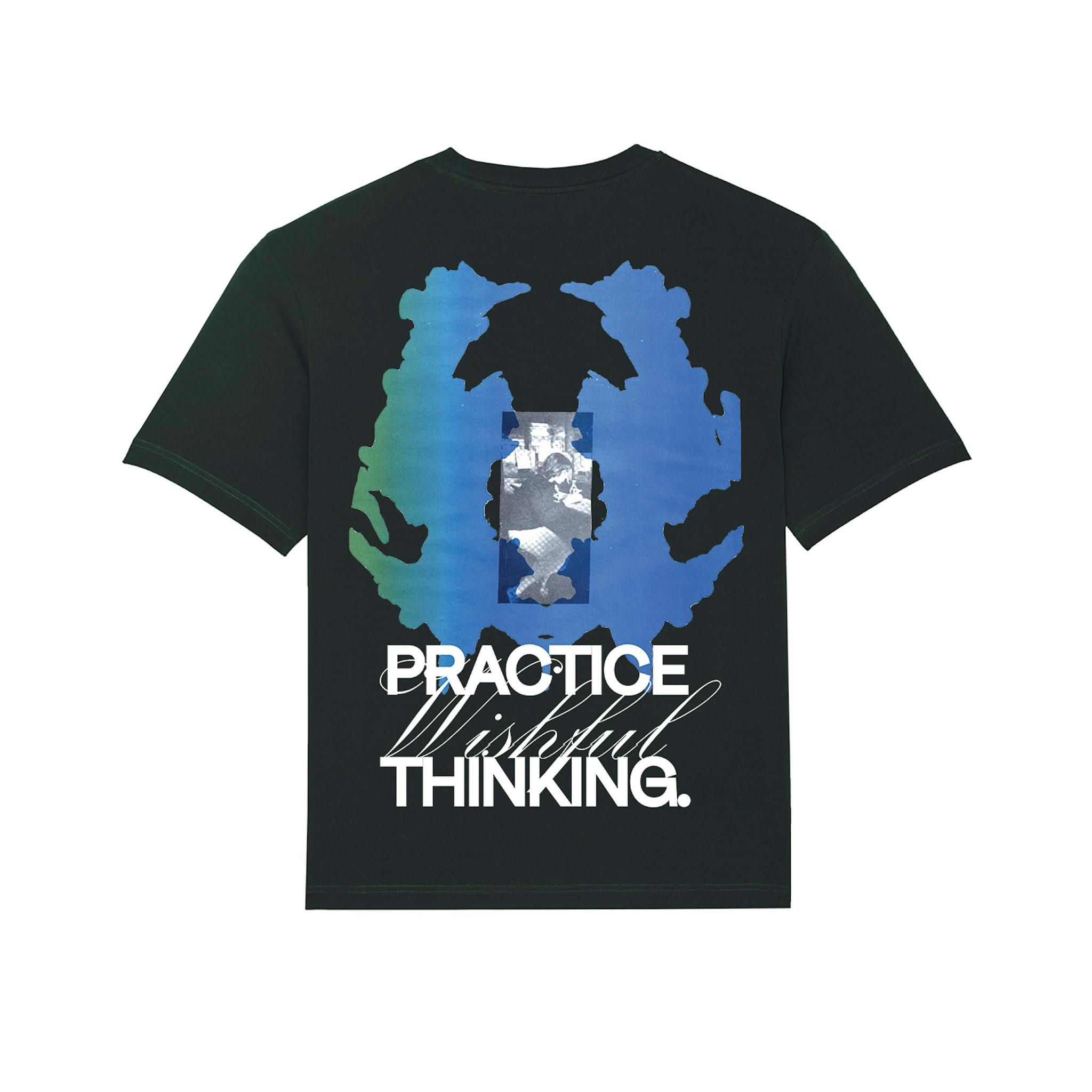 A black T-shirt with a large blue and green  graphic and text on the back saying "Practice Wishful Thinking"
