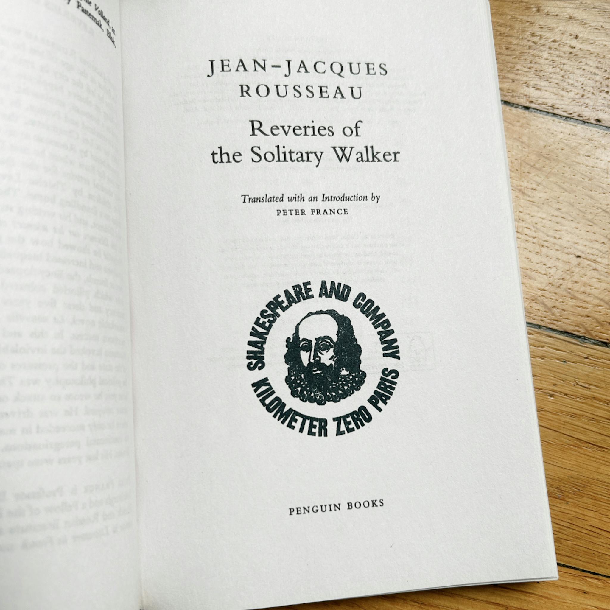 Close up title page to a book by Jean-Jacques Roussea's "Reveries of the Solitary Walker."