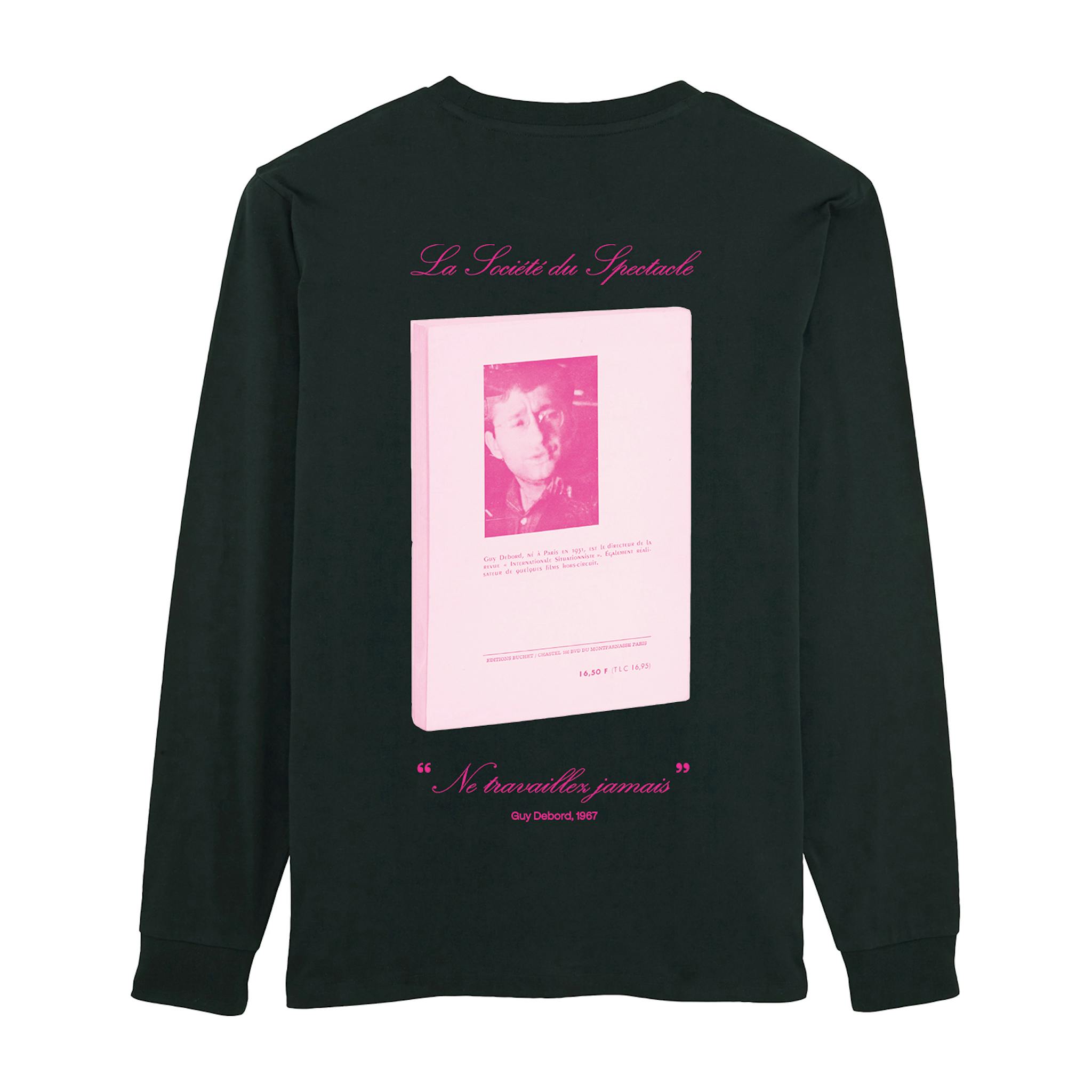 A black long-sleeve T-shirt with large pink book graphic on the back and french words over and underneath.