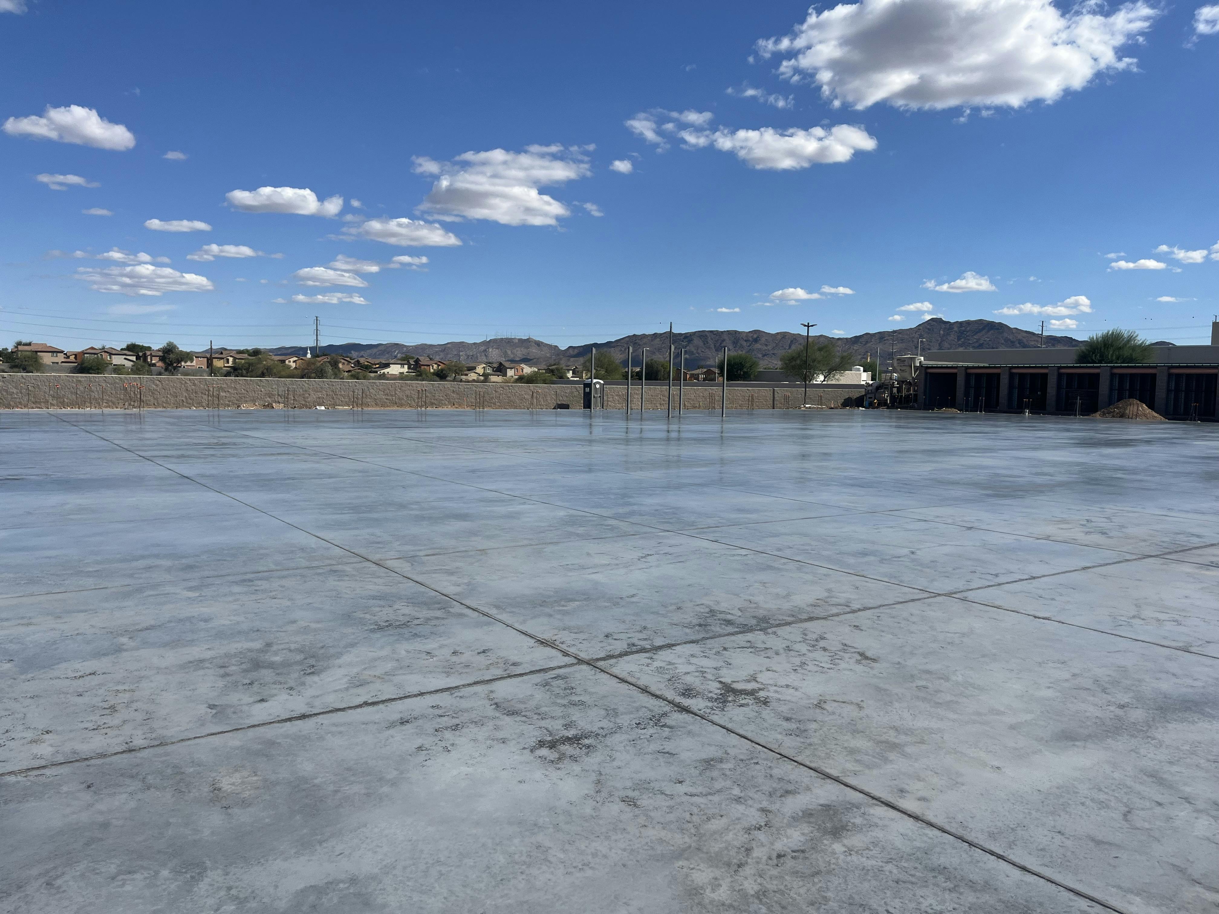 L&M Dress & Seal on this freshly poured storage unit slab .