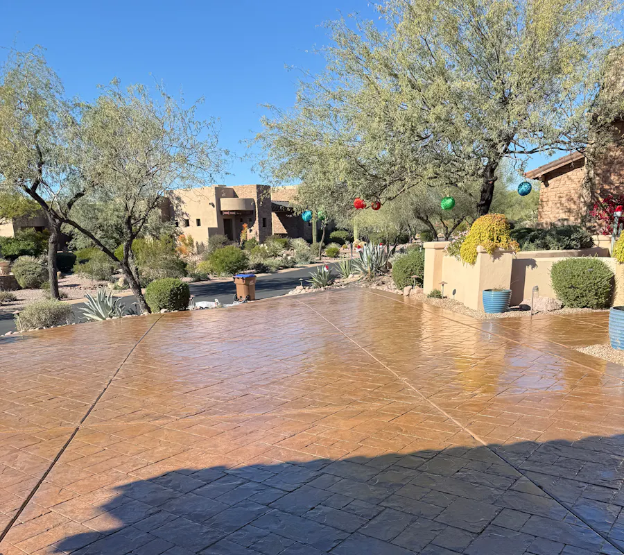 Commercial exterior patio with stamped concrete coating Arizona desert landscaping
