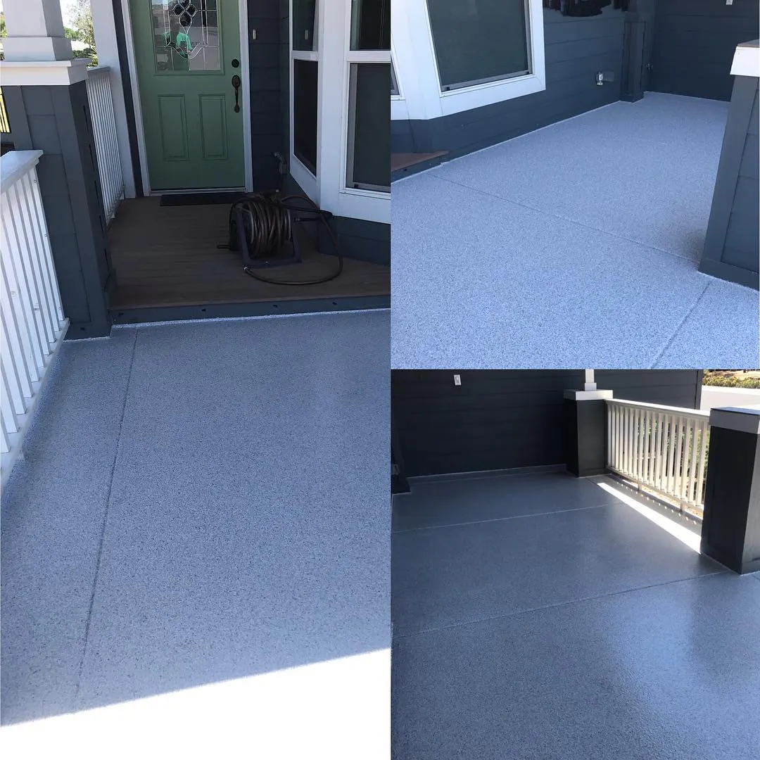 Residential front porch entryway with blue gray flake epoxy coating green door