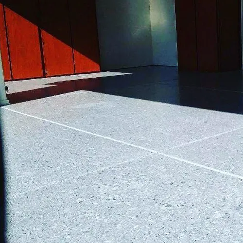 Commercial exterior patio with flake epoxy floor coating and diamond-cut pattern