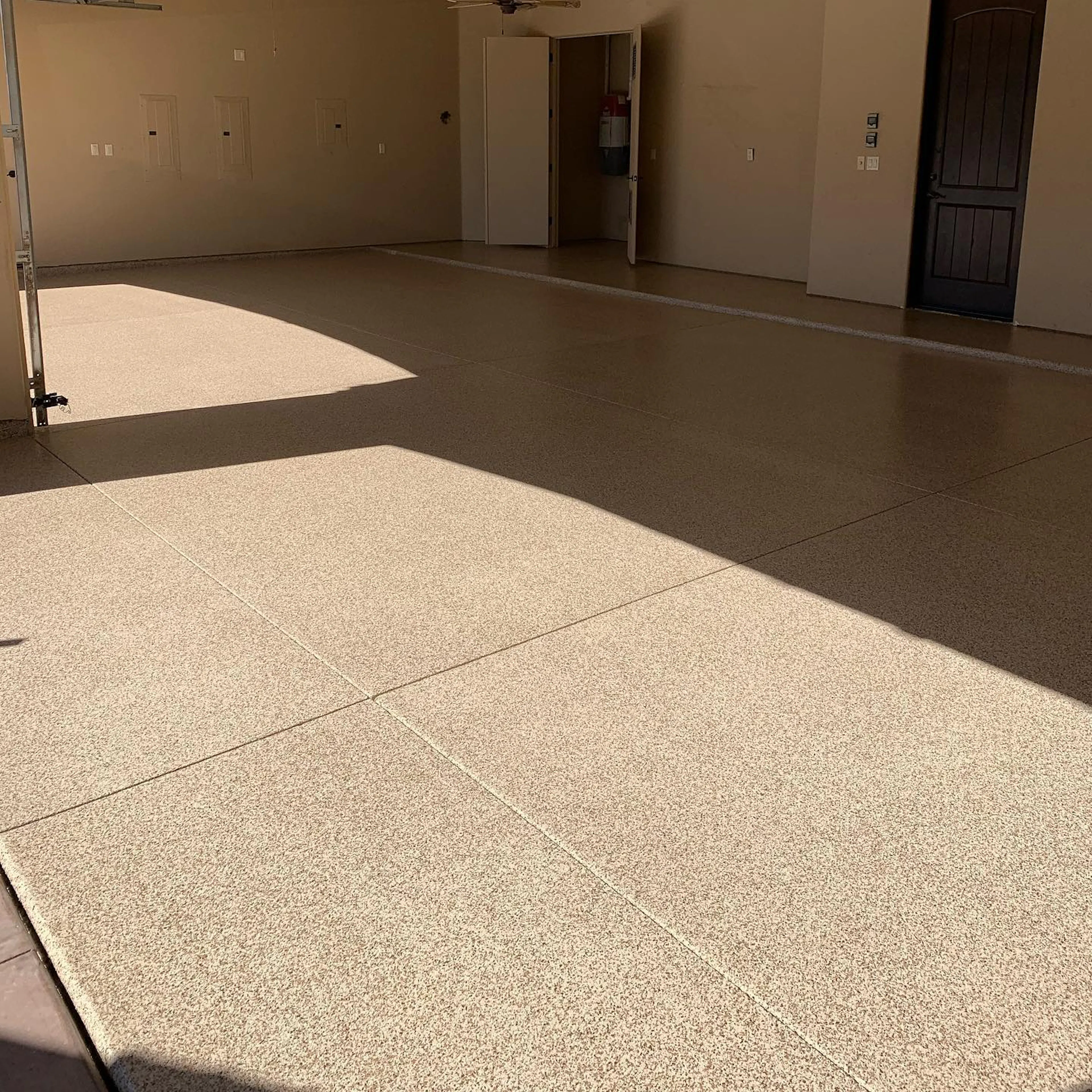 Residential garage with flake polyaspartic floor coating