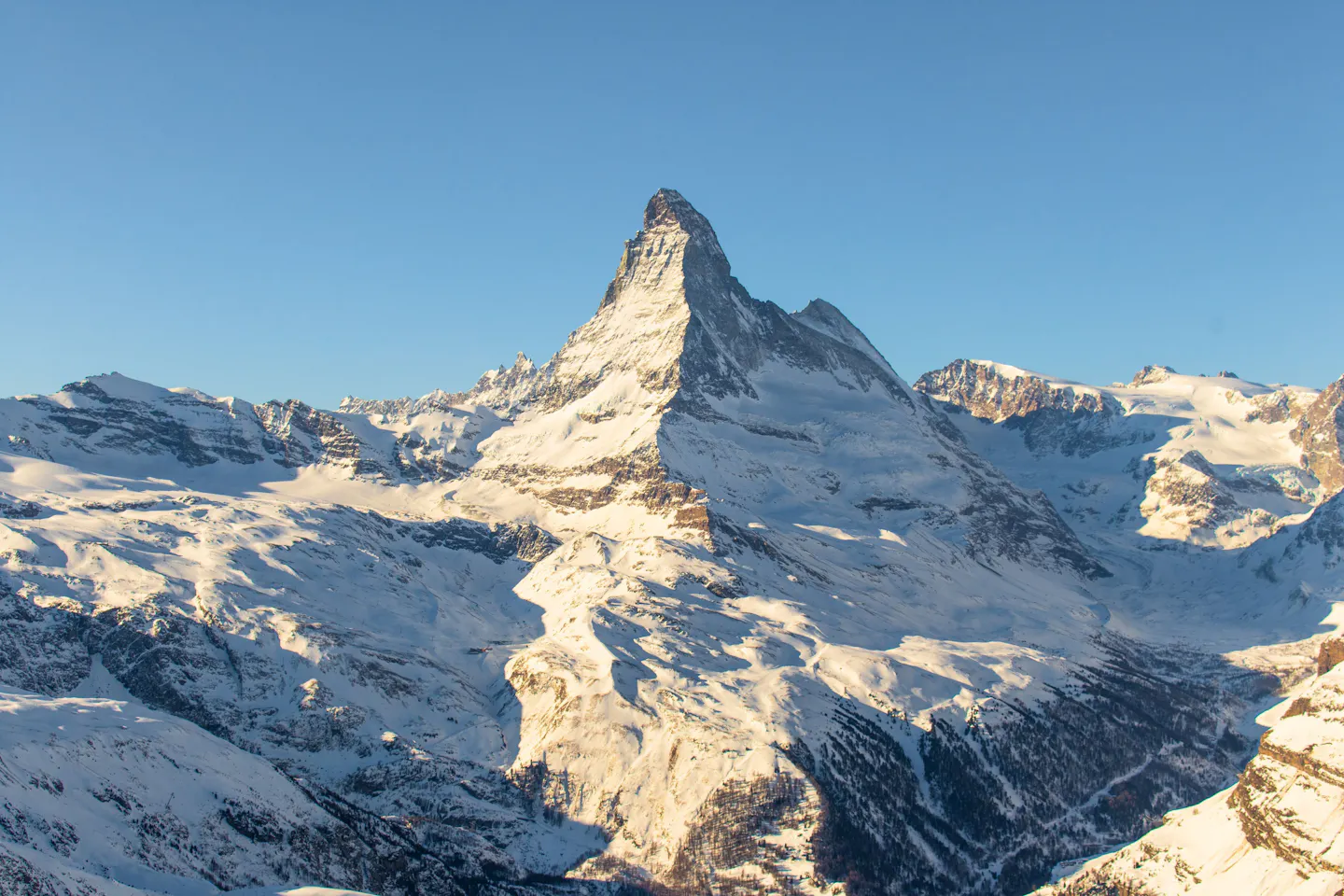 The Matterhorn above the snowy mountains near Zermatt, Switzerland