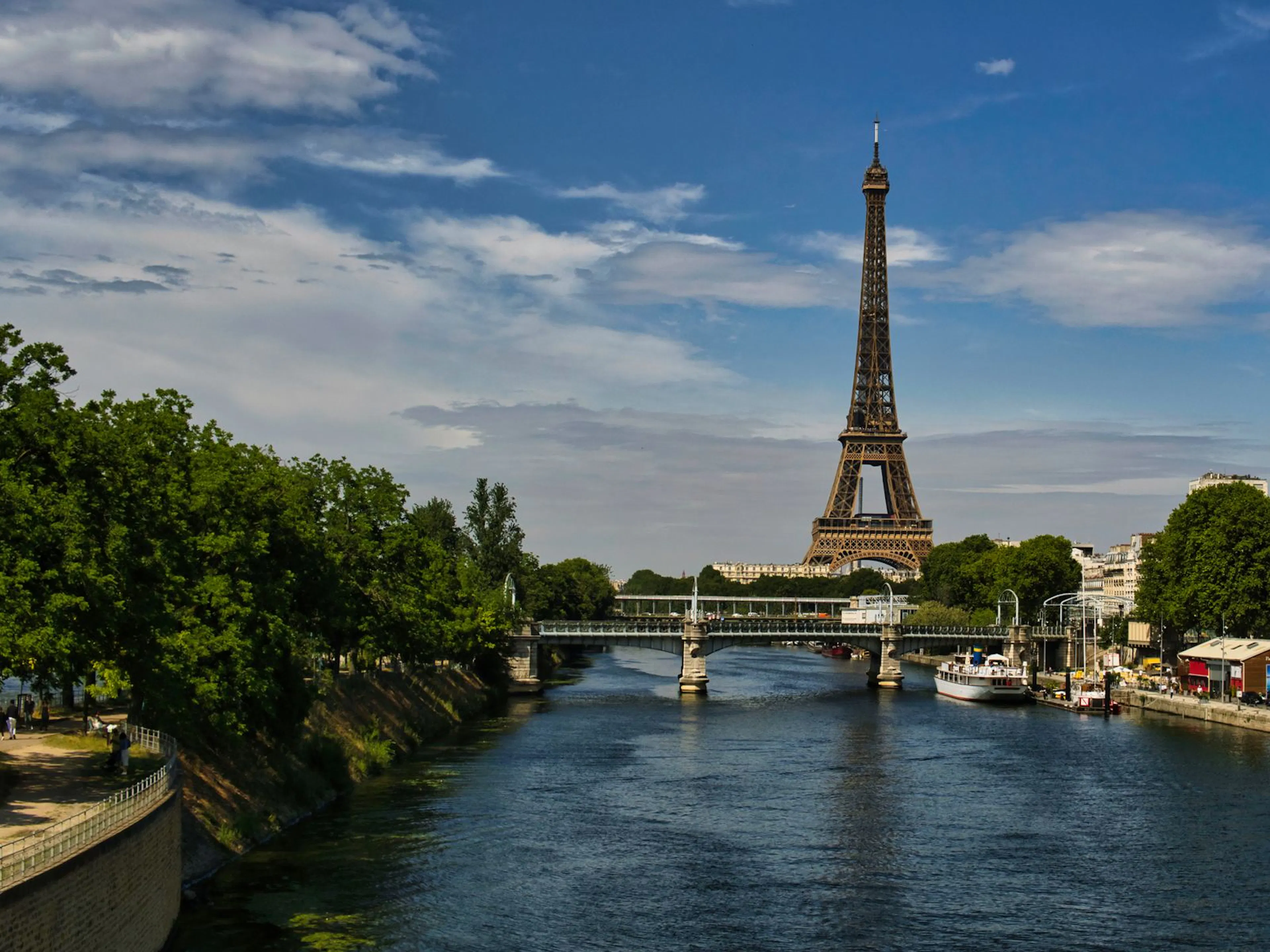 The Eiffel Tower above the Seine in Paris