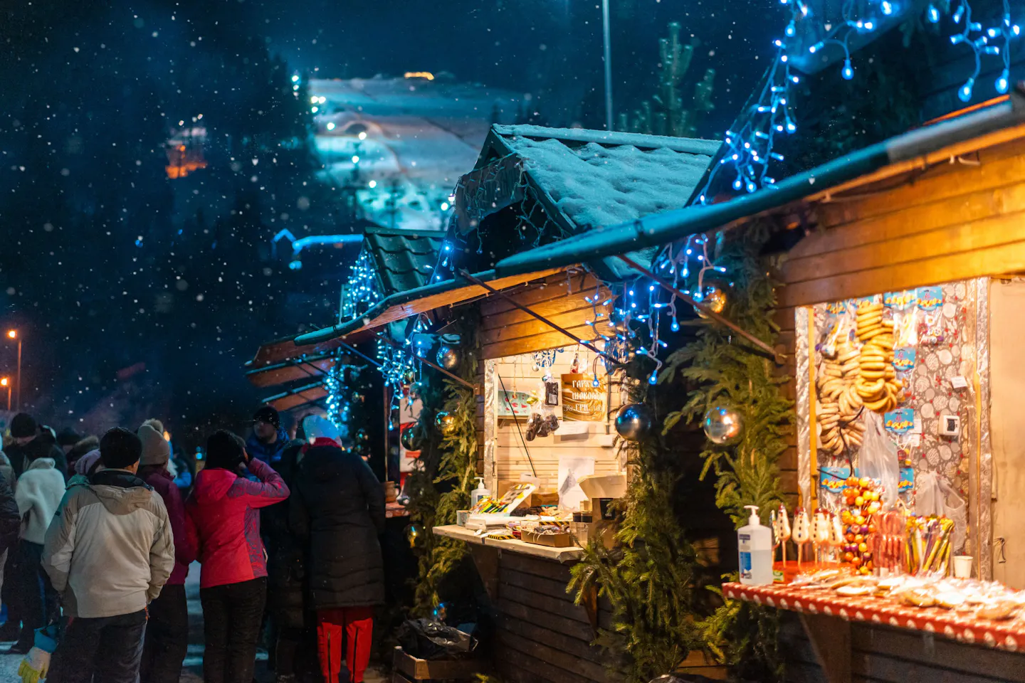 Ravenna Gorge Christmas market stalls glowing in the snow beneath the Black Forest trees