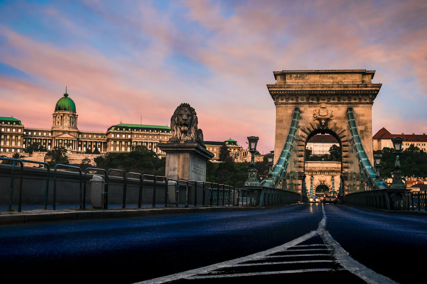 Dawn light over the Szechenyi Chain Bridge in Budapest with Buda Castle on the hill behind