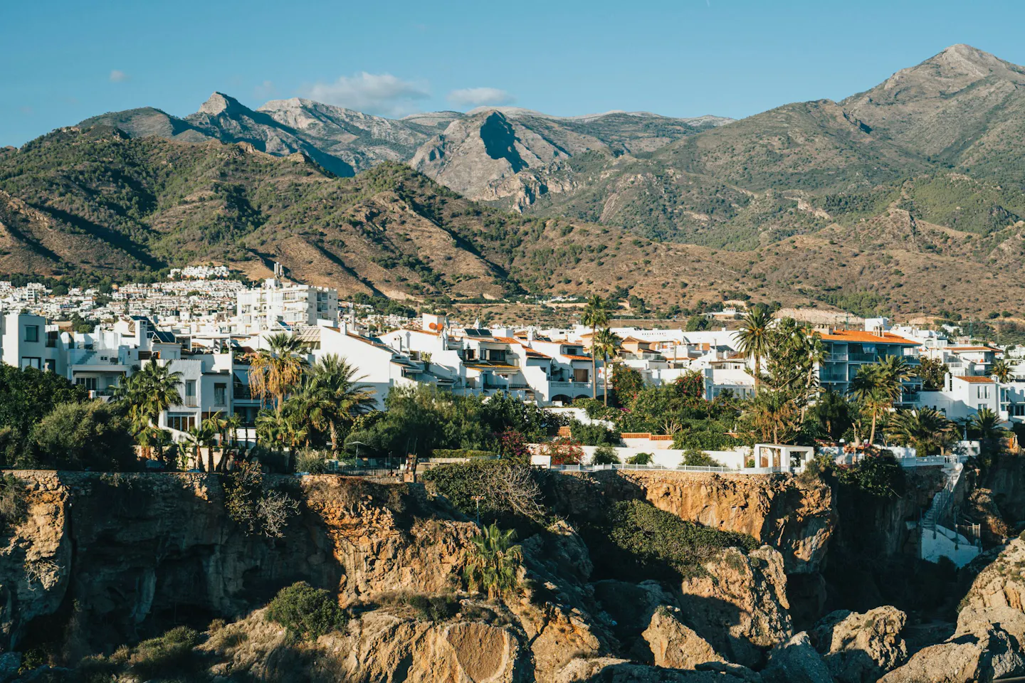 The white houses of Nerja on the Costa del Sol below the bare peaks of the Sierra Almijara