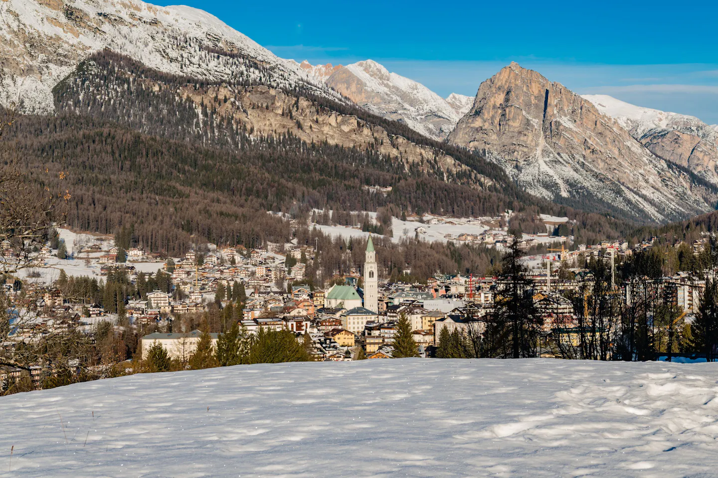 Cortina d'Ampezzo beneath the snow-dusted Dolomites in winter