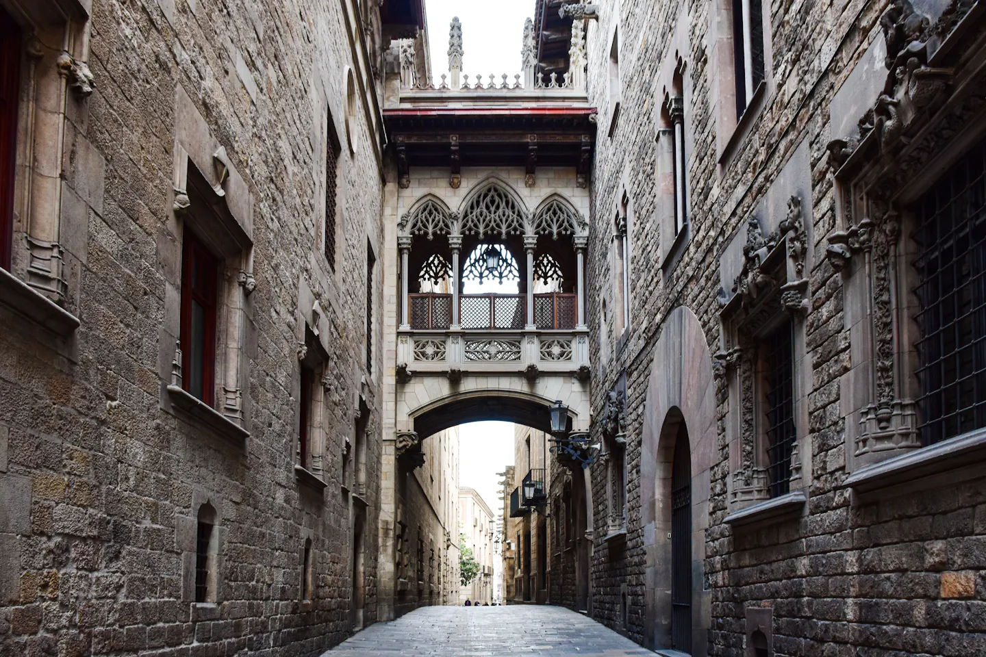 The carved stone bridge over a lane in Barcelona's Gothic Quarter