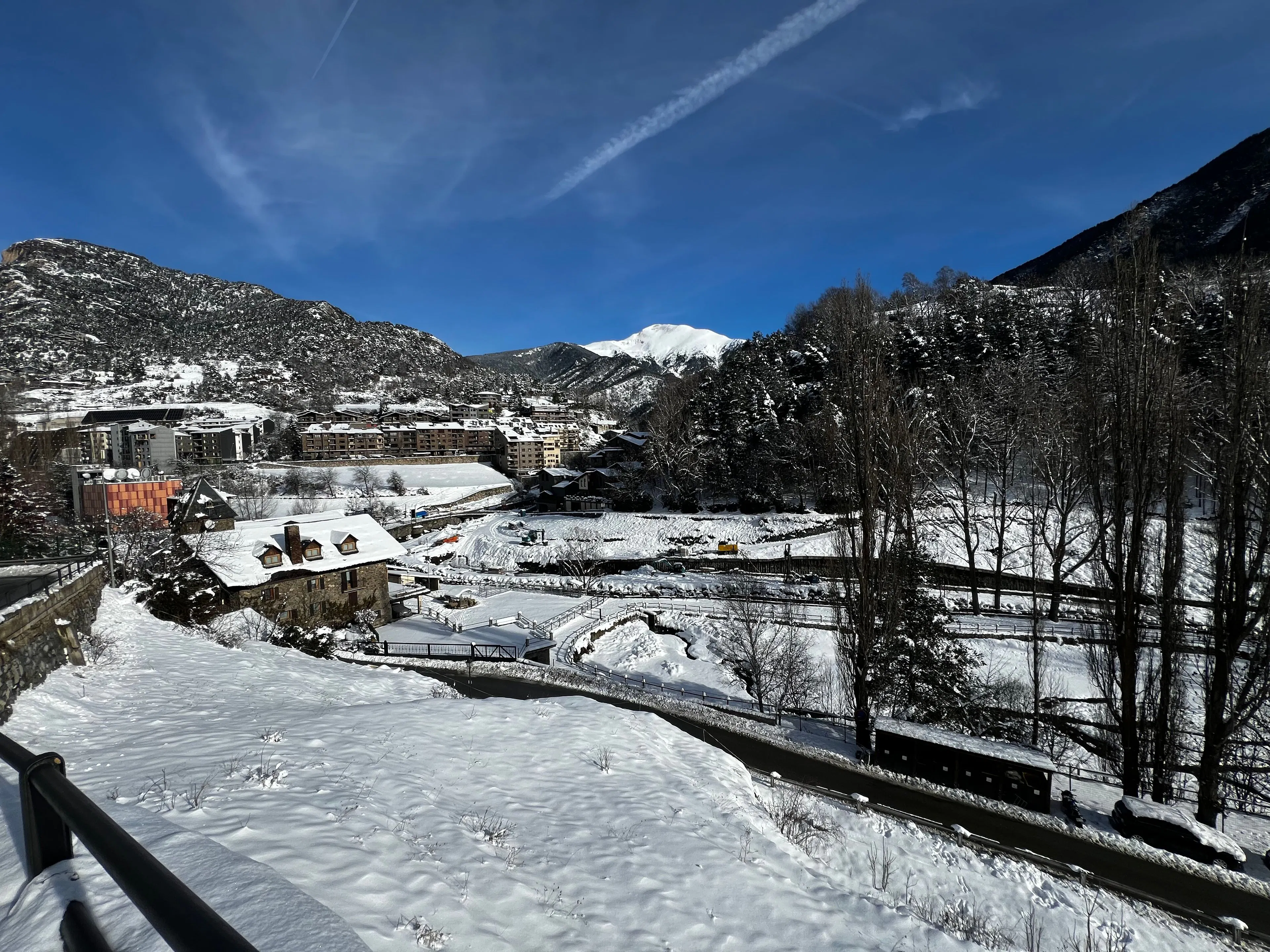 Snowy La Massana in Andorra, with mountain peaks and buildings in winter