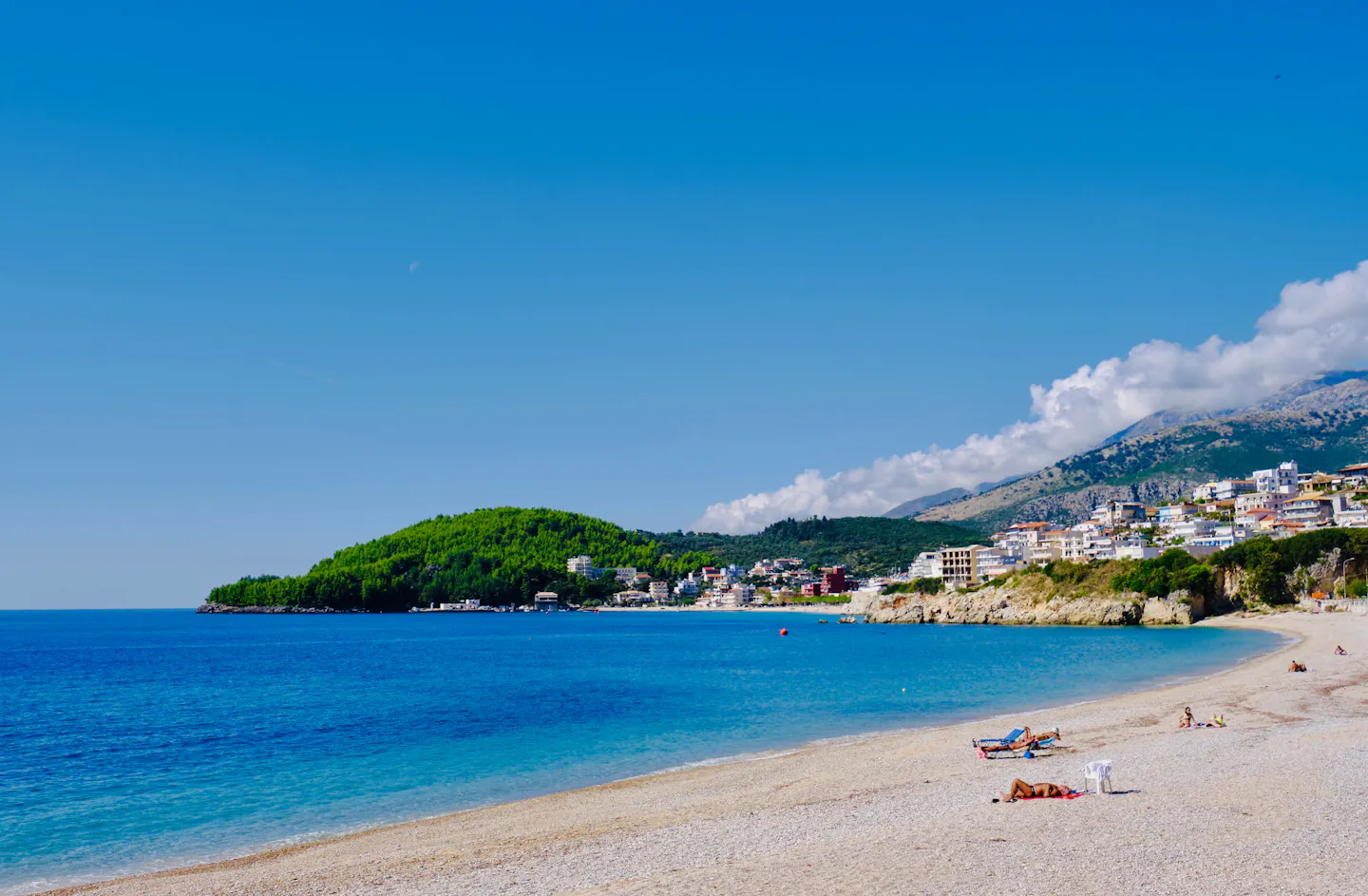 Clear blue water along the rocky shoreline at Himarë on the Albanian Riviera