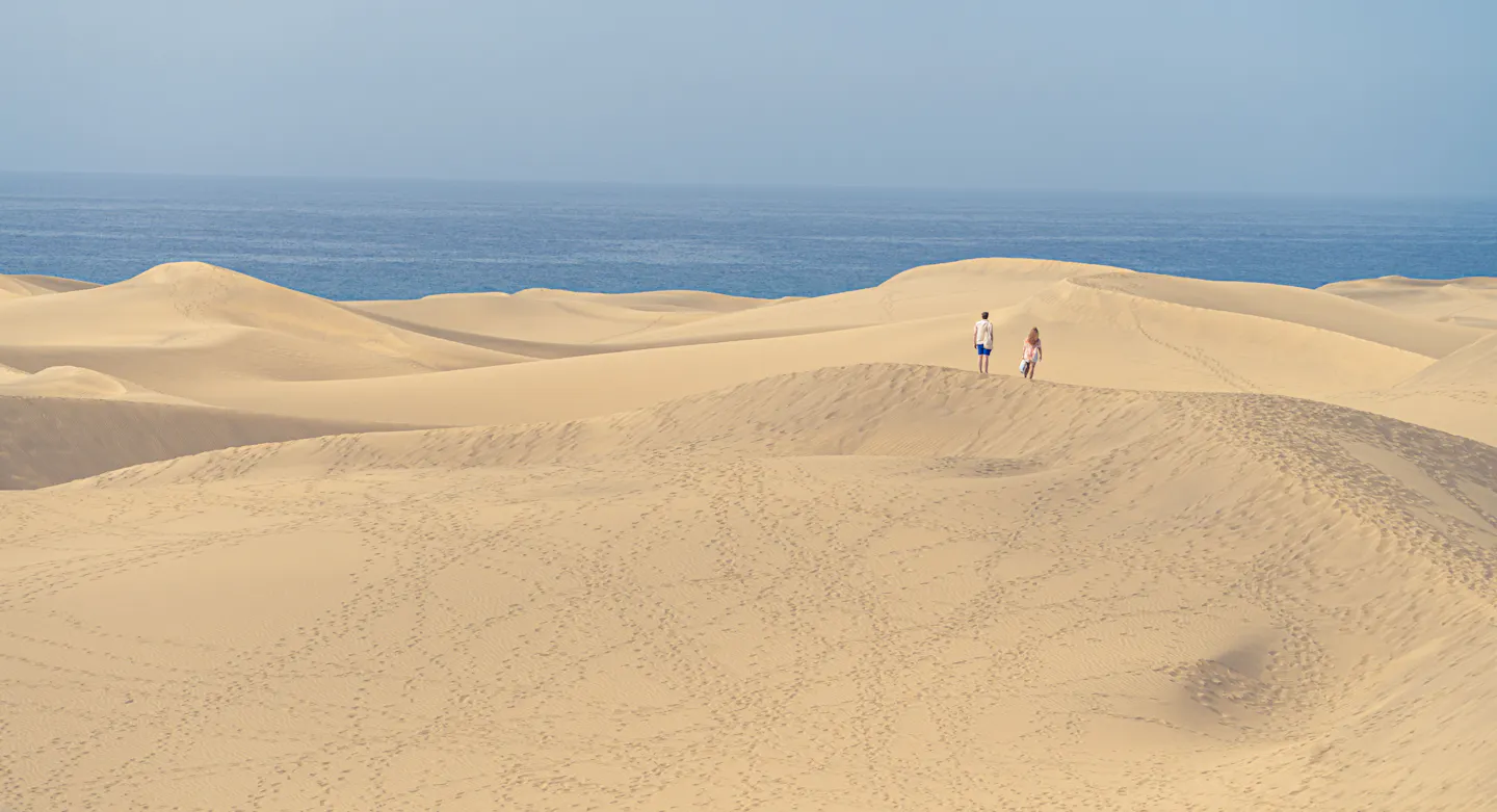 Rippled sand dunes at Maspalomas running down to the Atlantic on Gran Canaria