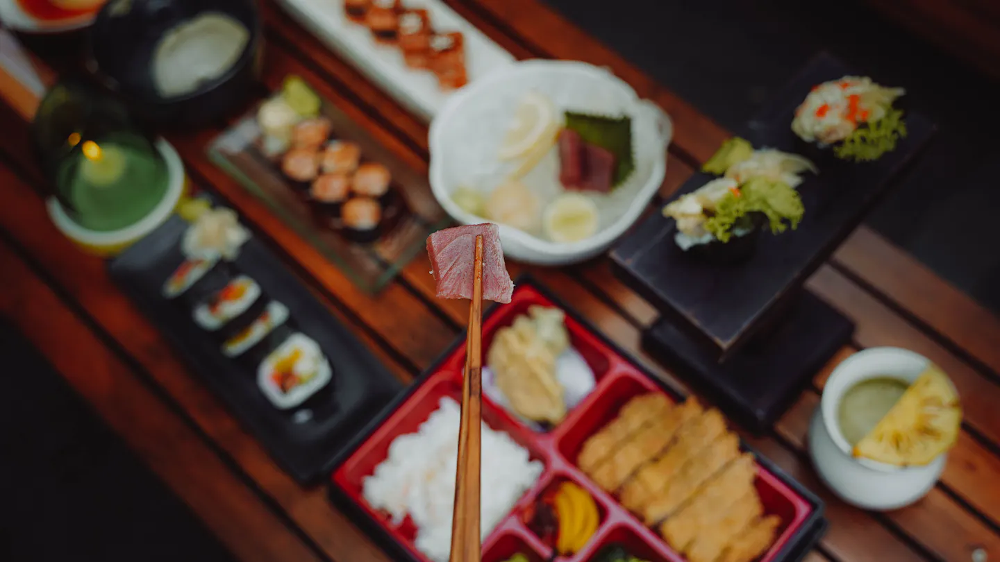 A Japanese meal with sushi and assorted dishes