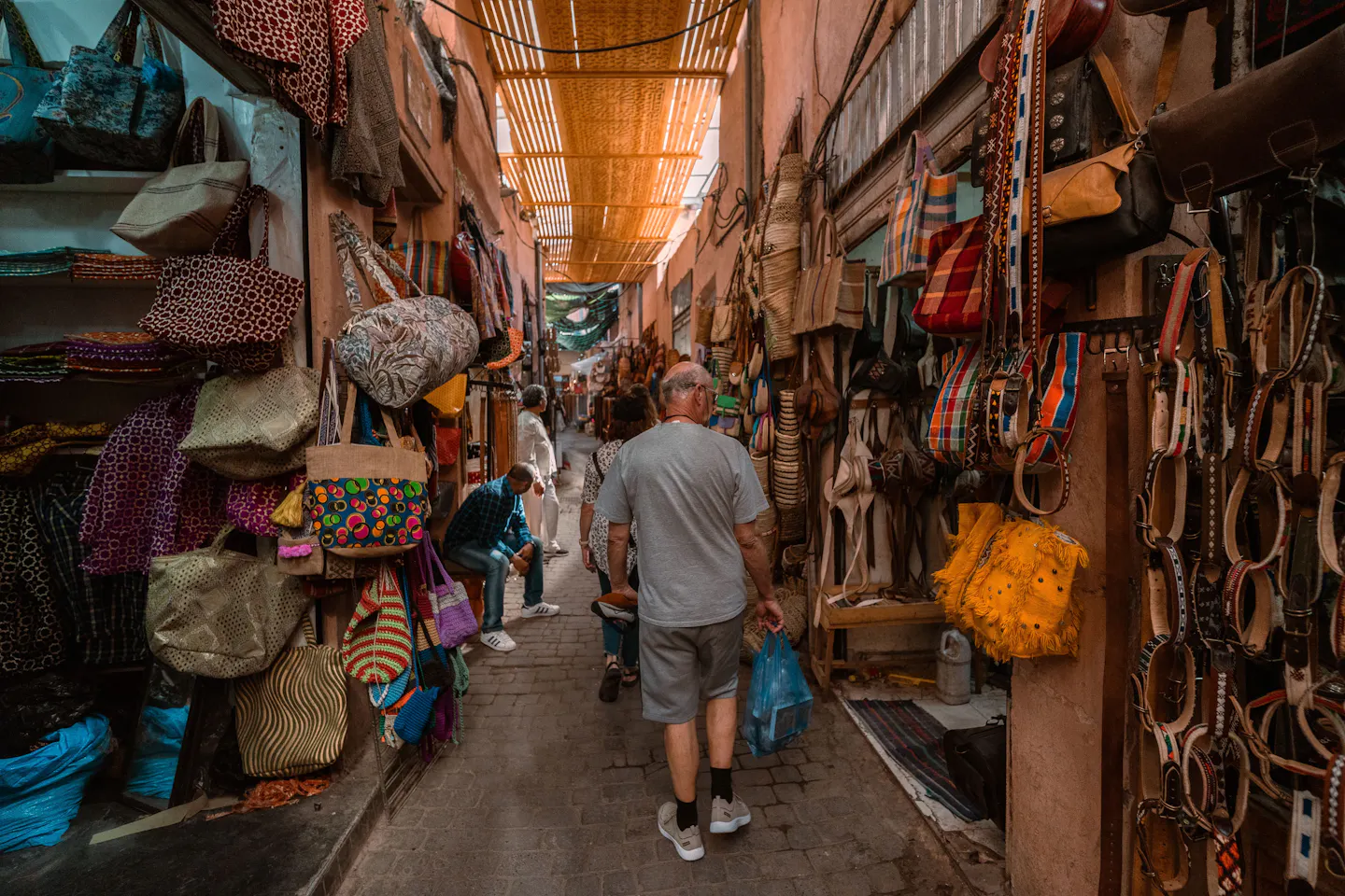 Colourful textiles and crafts on display in a Marrakech souk