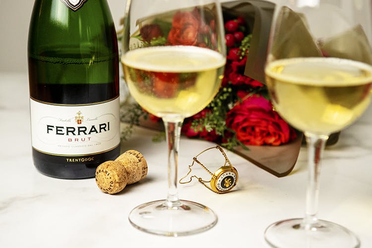 Ferrari prosecco glasses and bottle