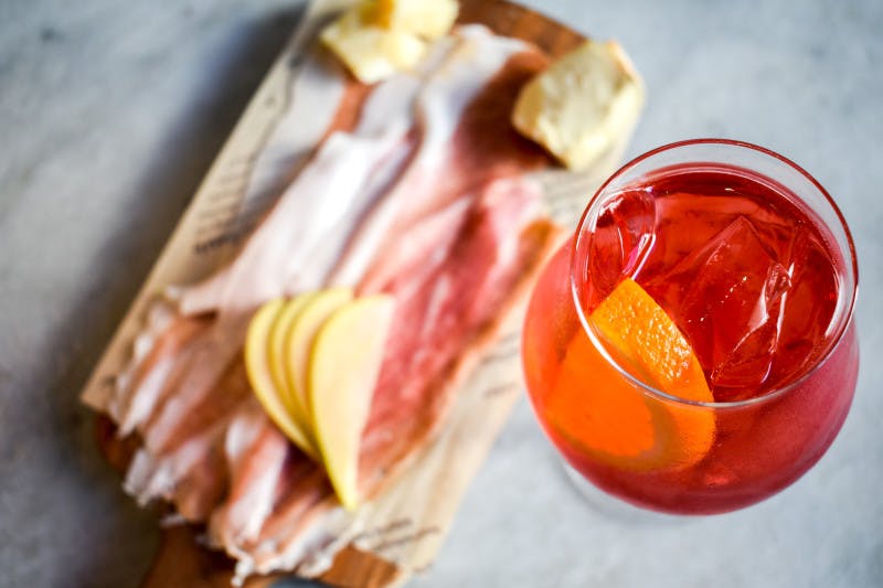 Aperol spritz and salumi board