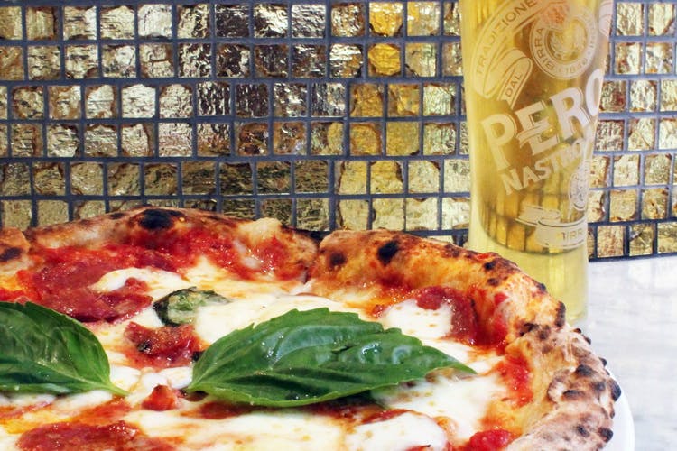 Pizza and Peroni beer