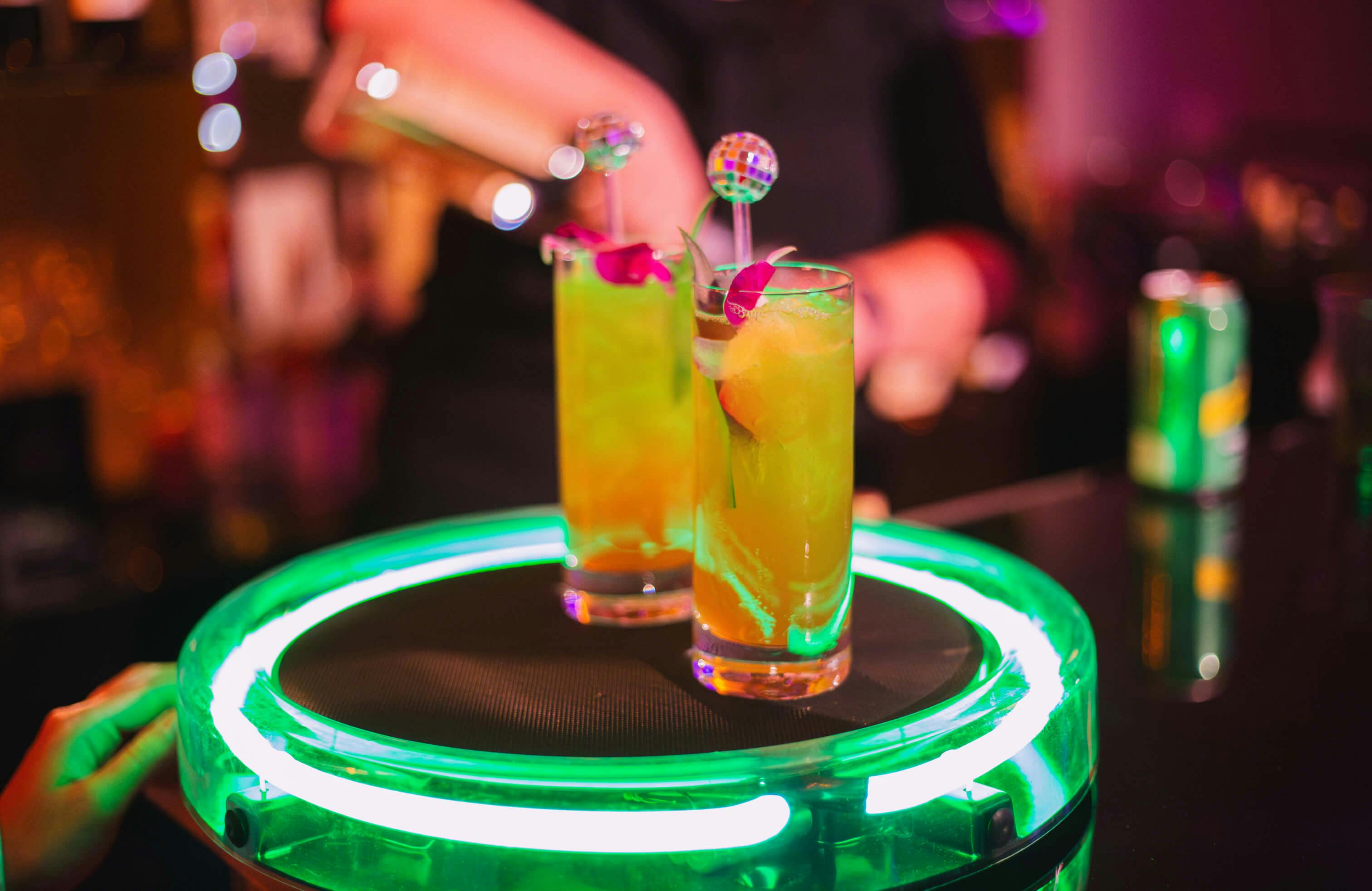 Cocktails on a neon tray