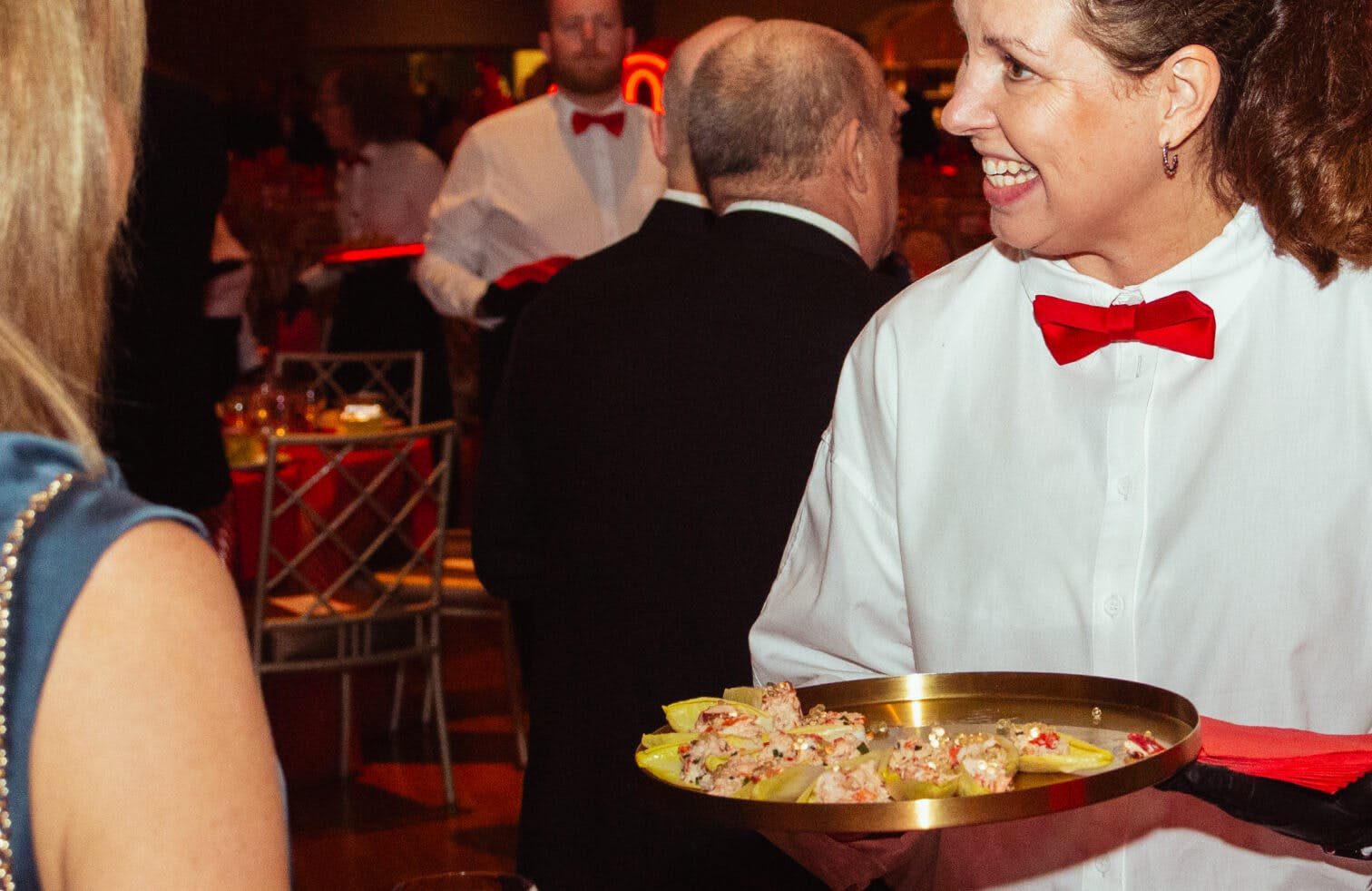 Server offering appetizers