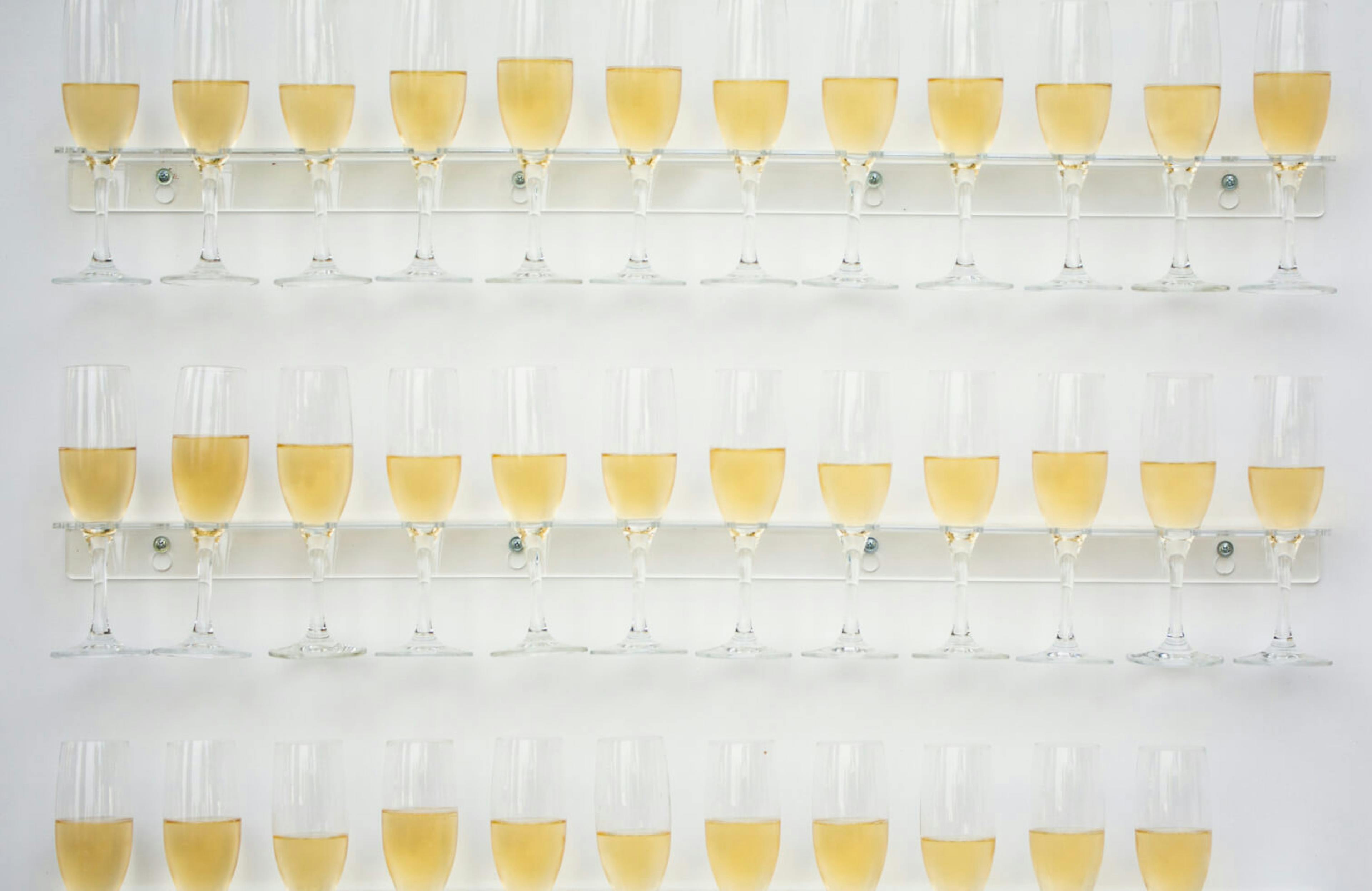 Wall of champagne glasses