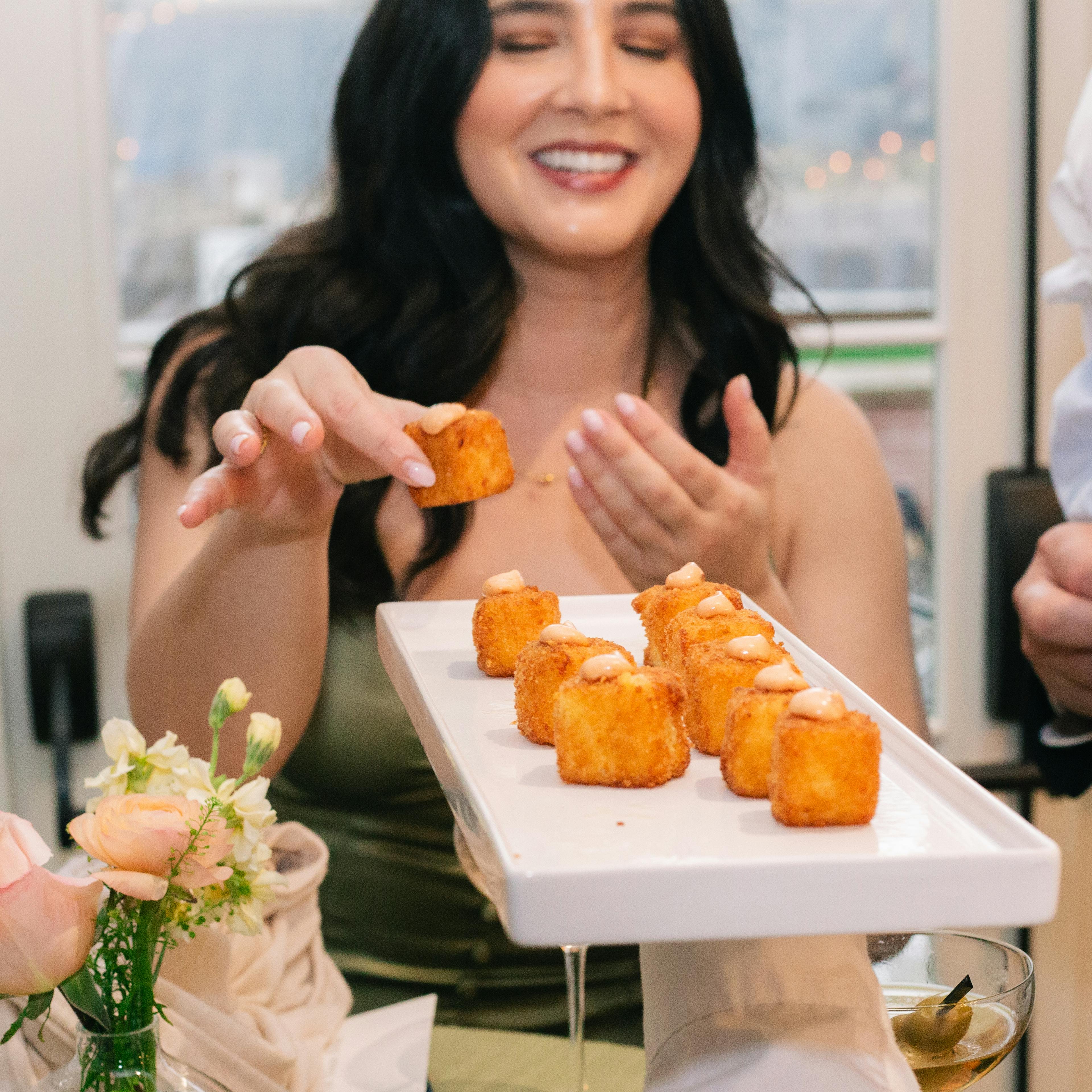 Woman taking appetizer