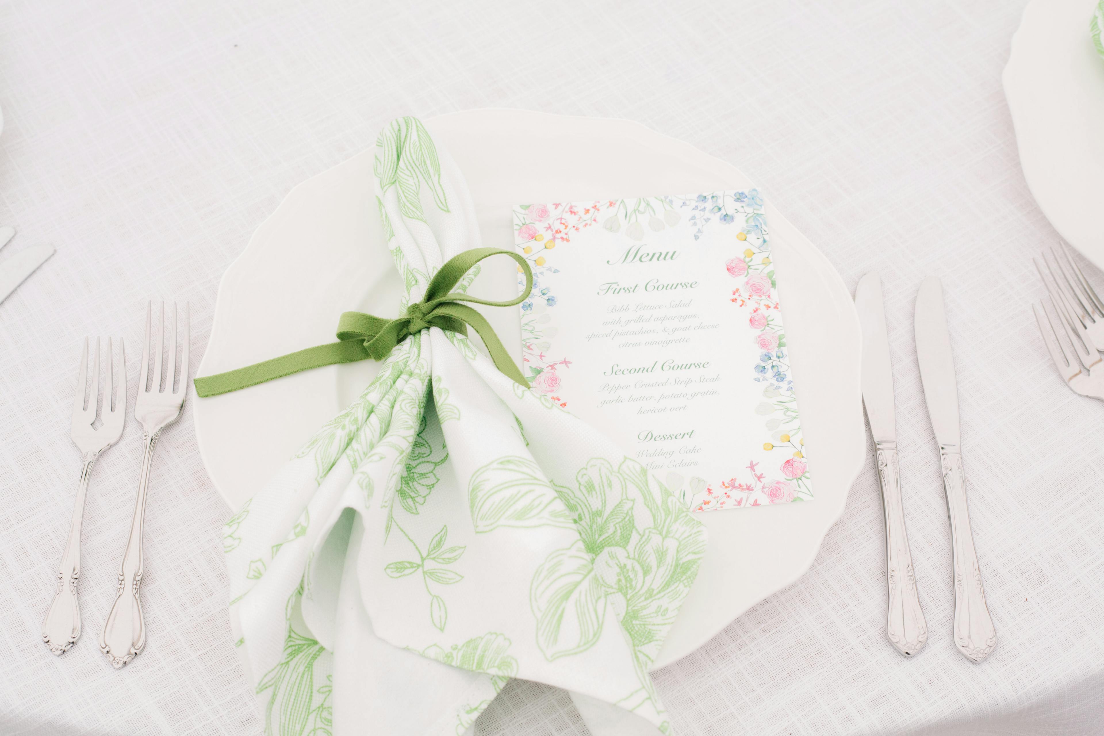 napkin beautifully tied with ribbon at a place setting