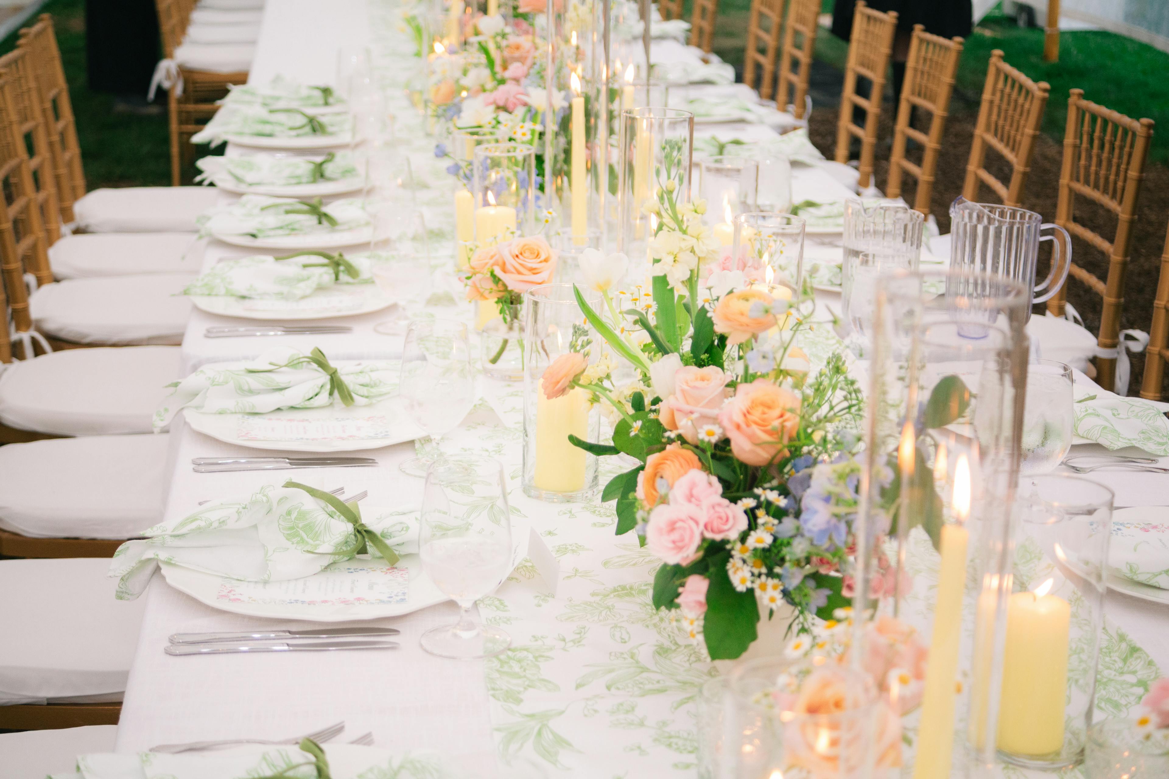 table set with candles and flowers 