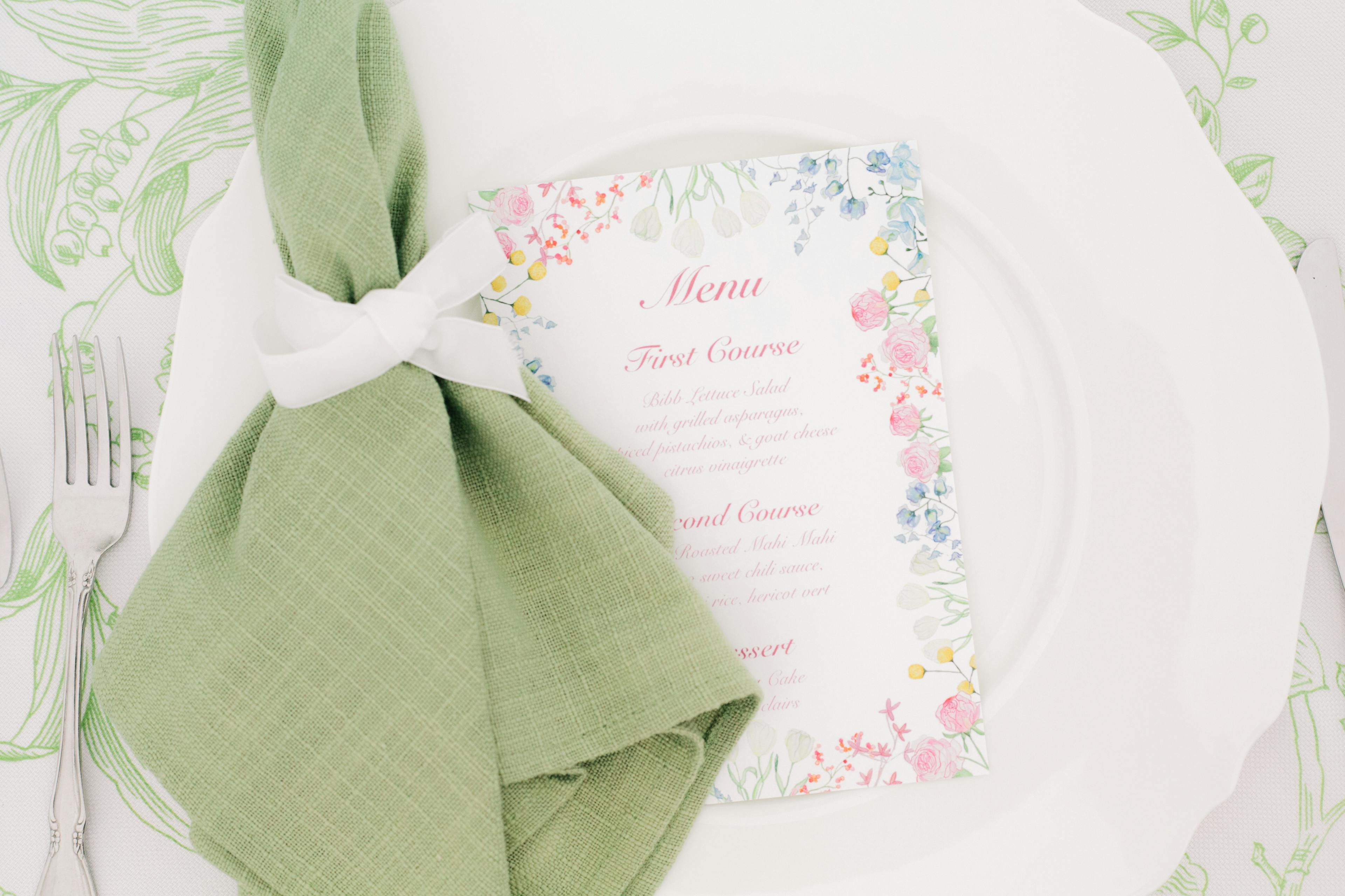 place setting with napkin and menu card