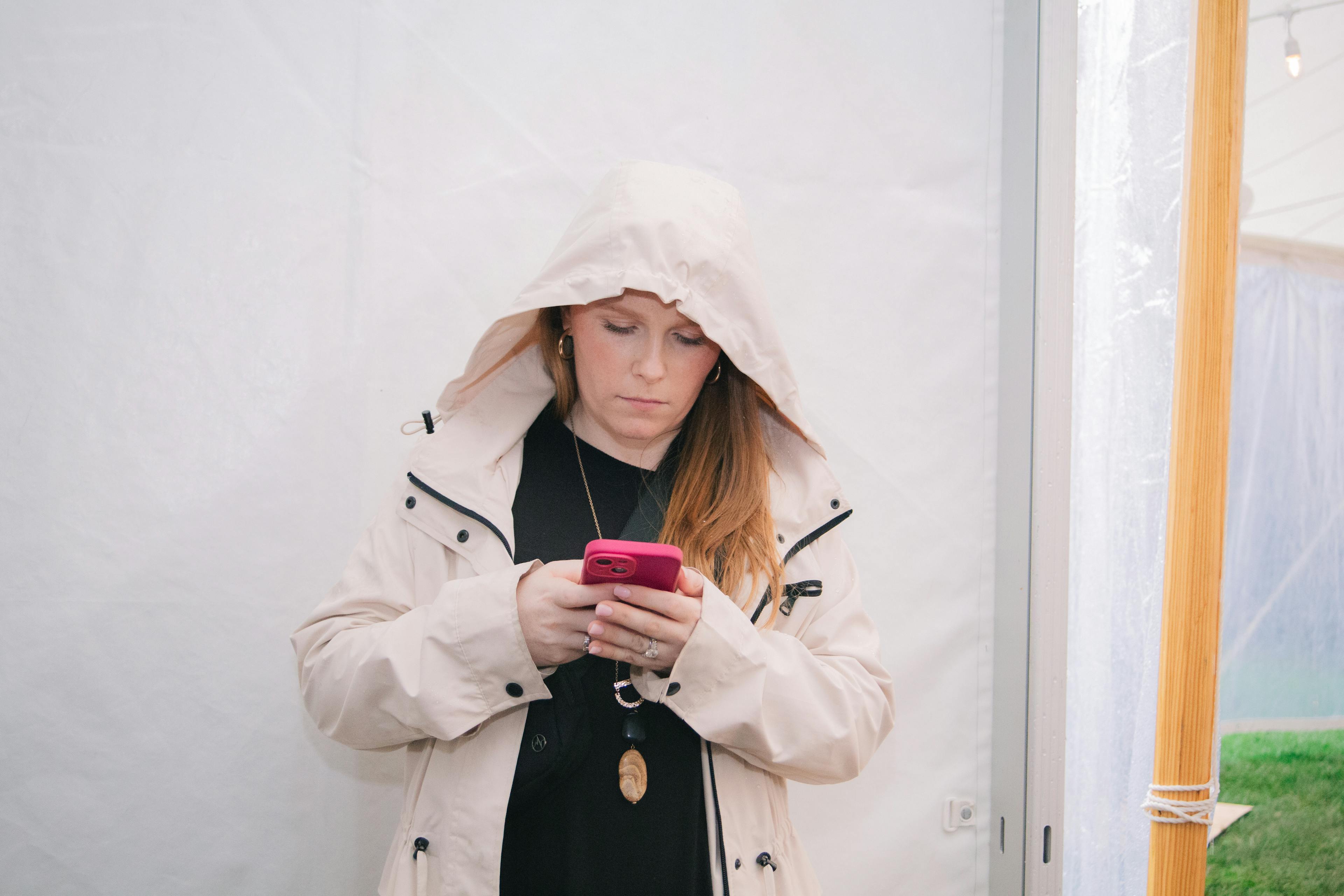 Sales specialist in the rain at an event
