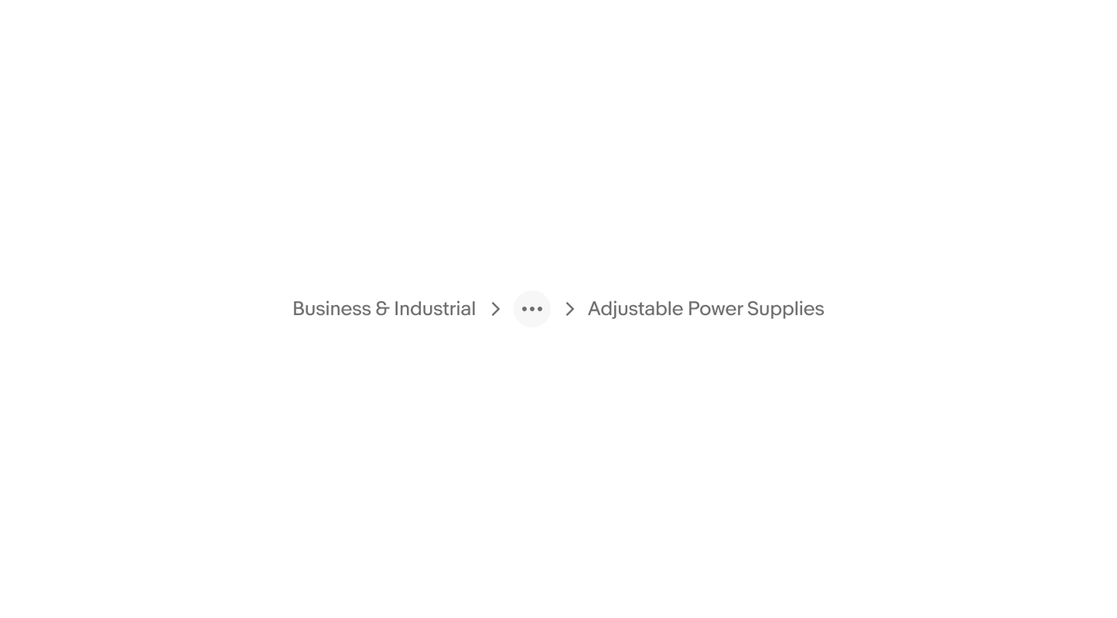 Breadcrumb navigation showing two categories: Business & Industrial and Adjustable Power Supplies, separated by an overflow icon with chevrons on both sides.