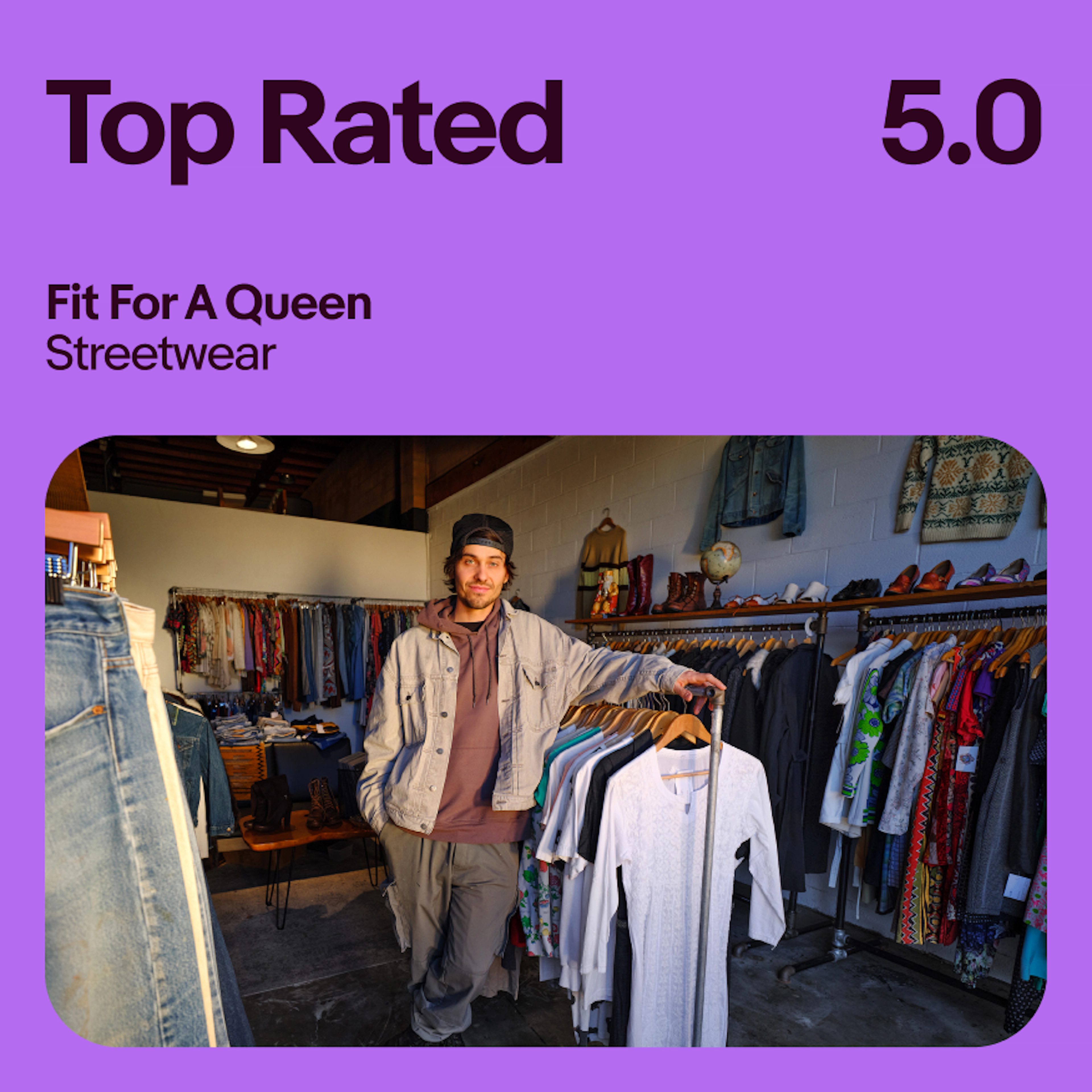 A vibrant purple ad with an image of an eBay seller in his shop of fashionable clothes. The type at the top is using approved letter spacing.