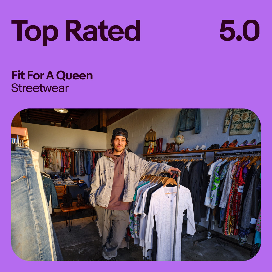 A vibrant purple ad with an image of an eBay seller in his shop of fashionable clothes. The type at the top is using approved letter spacing.